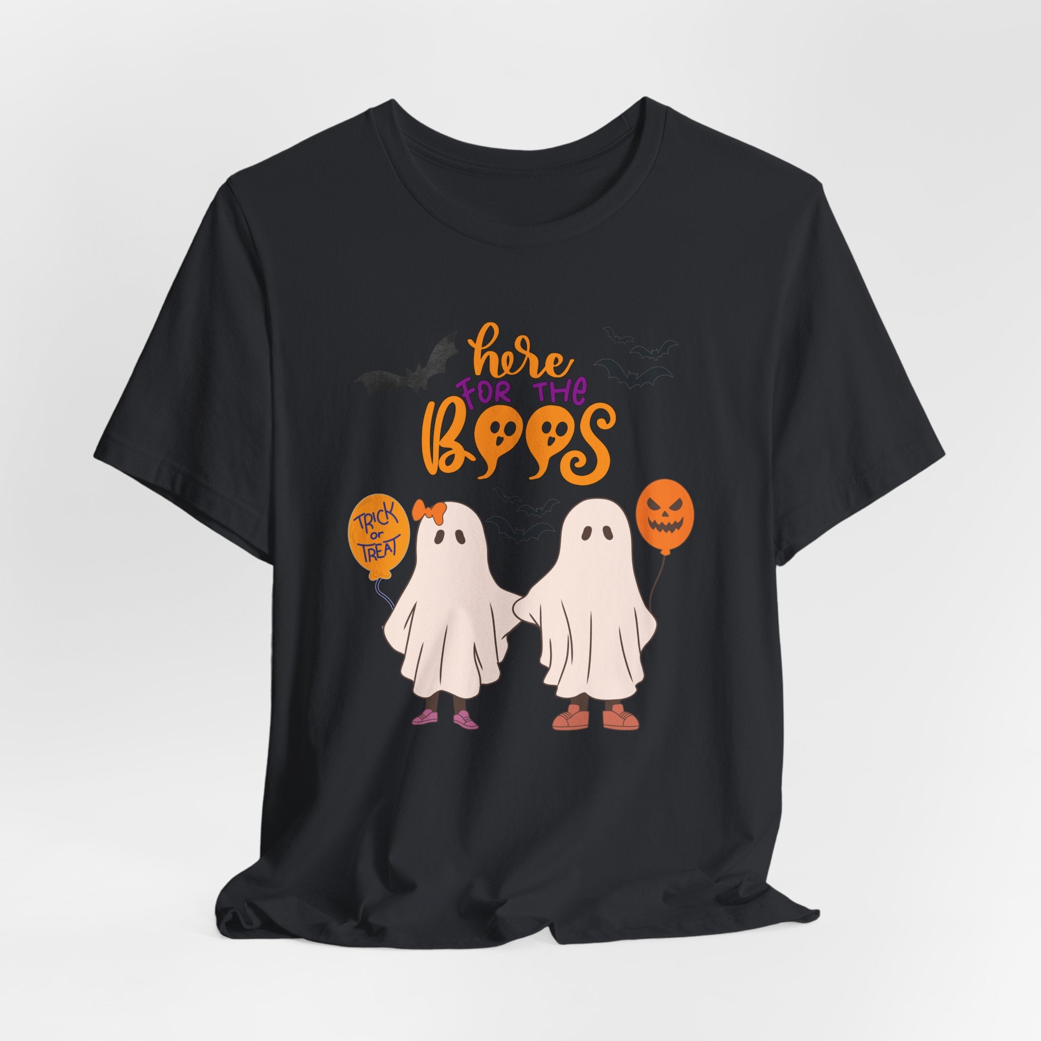 Vintage black t-shirt with Halloween-themed design featuring ghosts and text on a white background