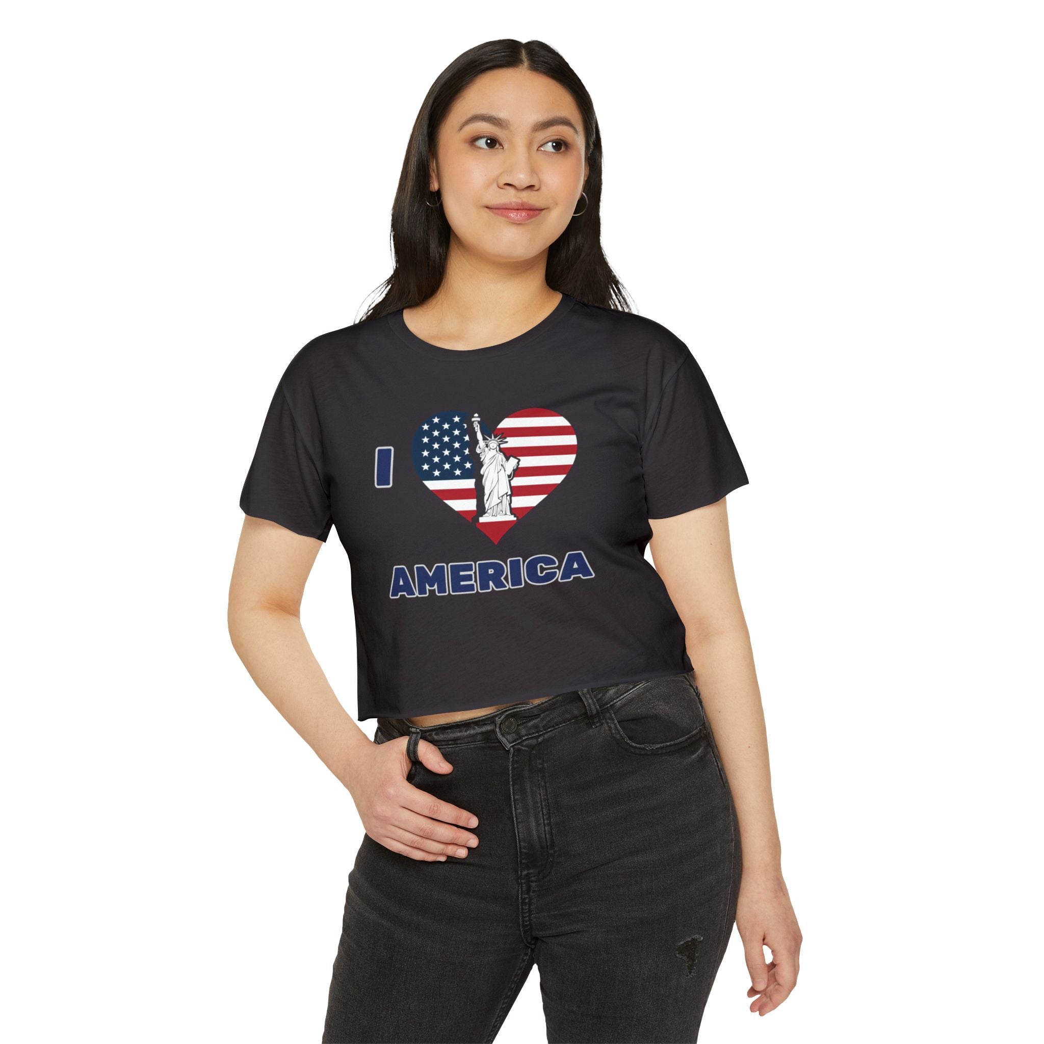 Woman wearing a black t-shirt with 'I ❤️ AMERICA' design on a white background