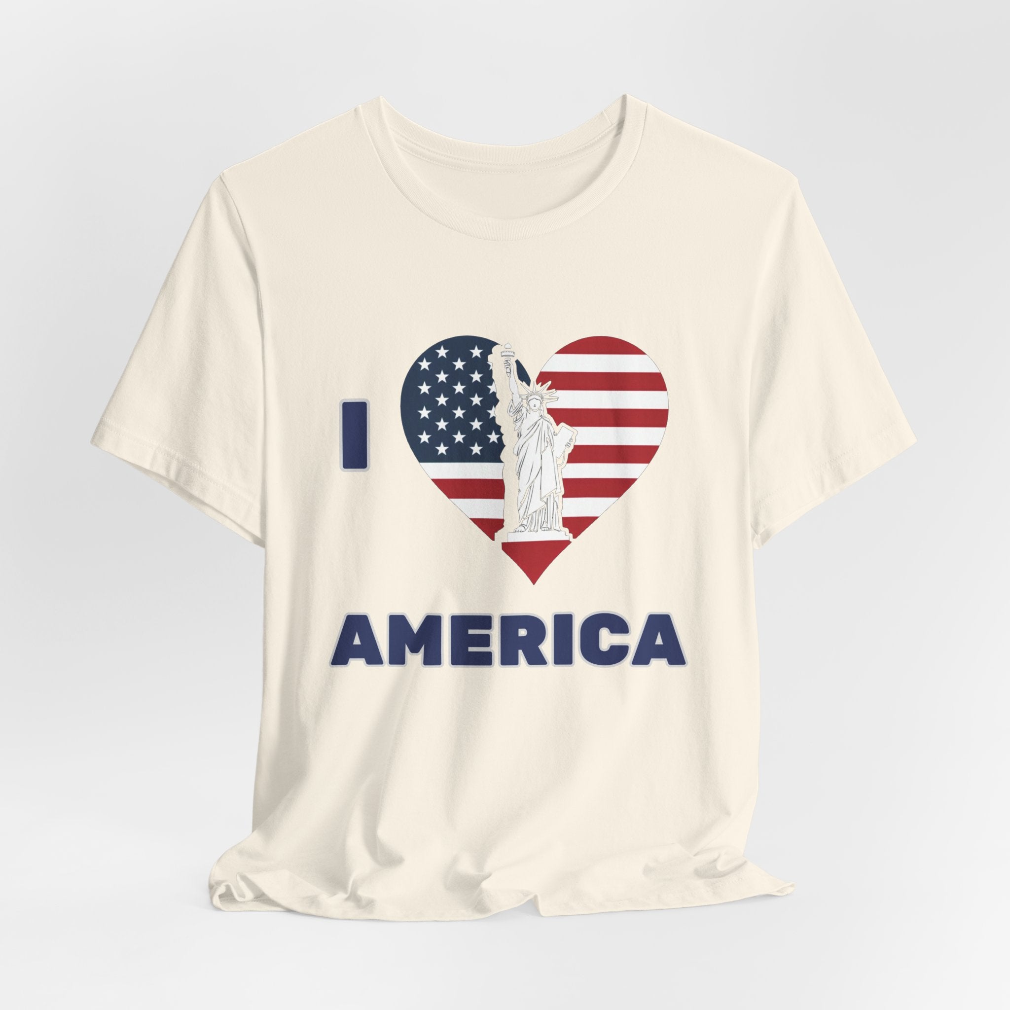 Ivory beige t-shirt with 'I Love America' design featuring the Statue of Liberty on a gray background