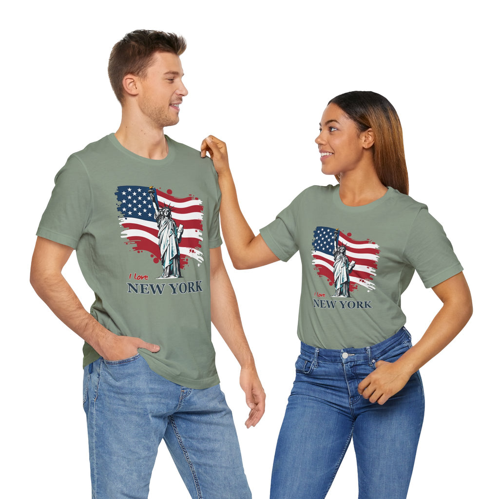 Two people wearing green t-shirts with a design of the Statue of Liberty and American flag, labeled 'I love New York'.