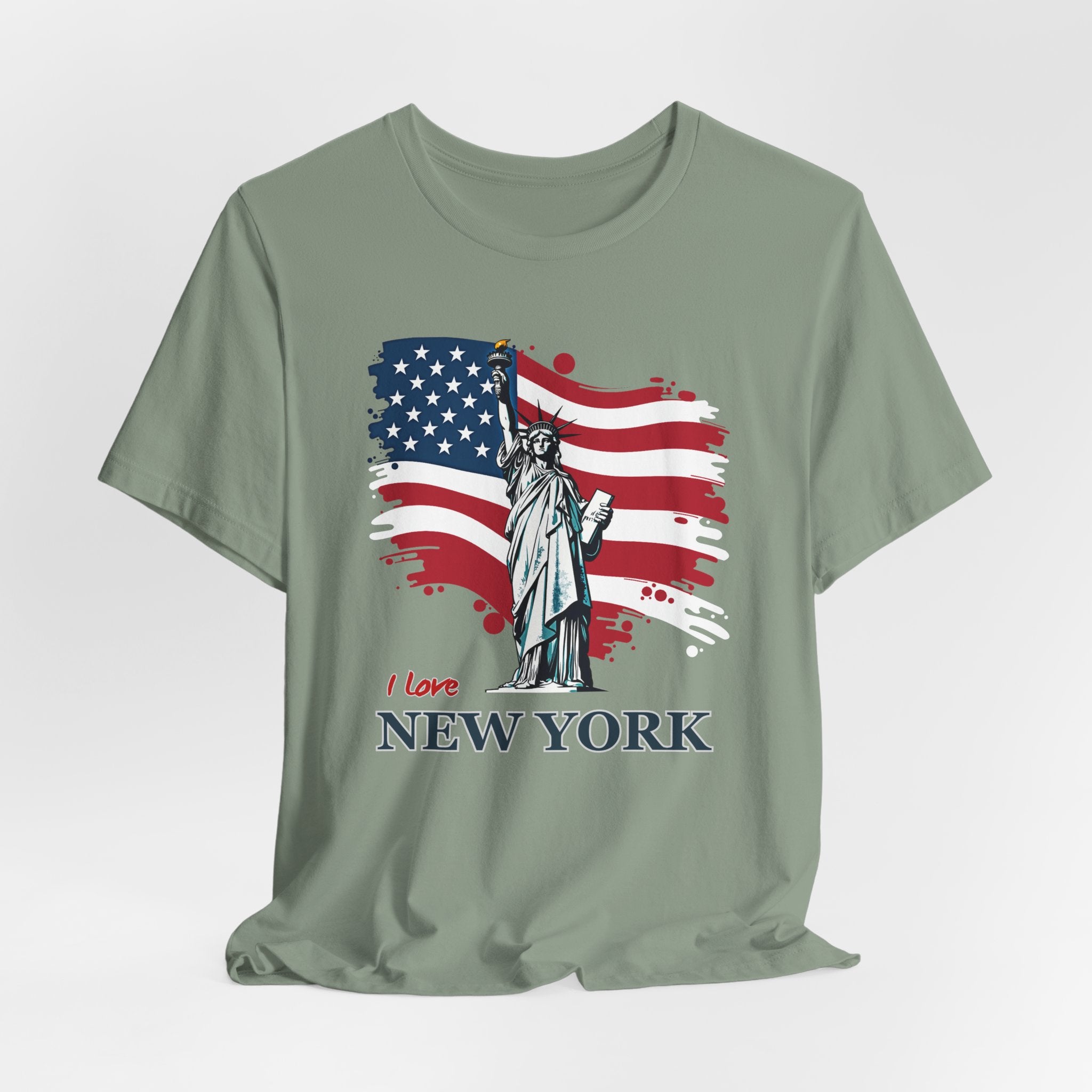 Sage green t-shirt with Statue of Liberty and American flag design with I love New York text on a white background