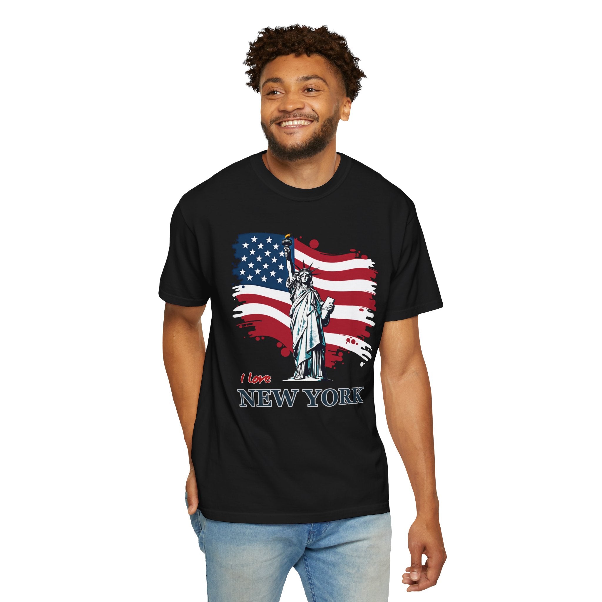 Man wearing a black t-shirt with an American flag and Statue of Liberty design on a white background