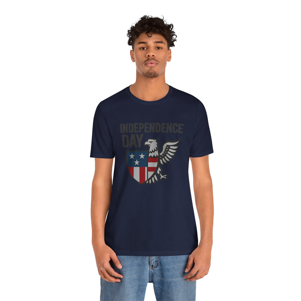 Person wearing a navy blue t-shirt with 'Independence Day' design on a white background