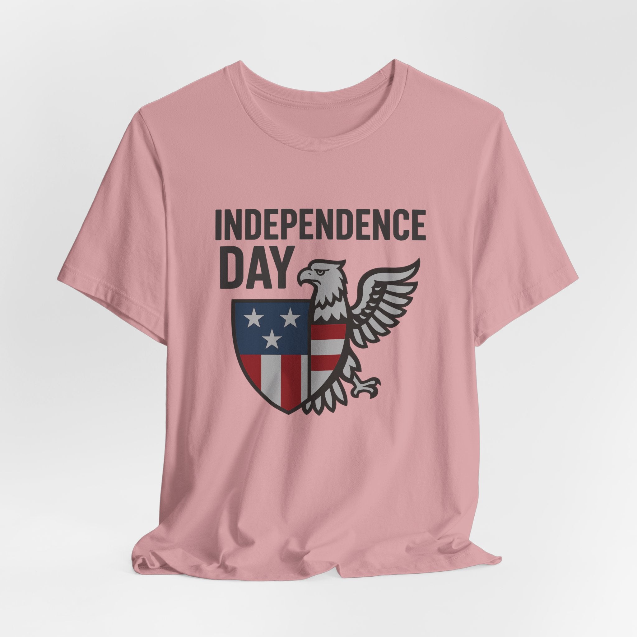 Orchid pink t-shirt with 'Independence Day' graphic featuring an eagle and shield on a white background