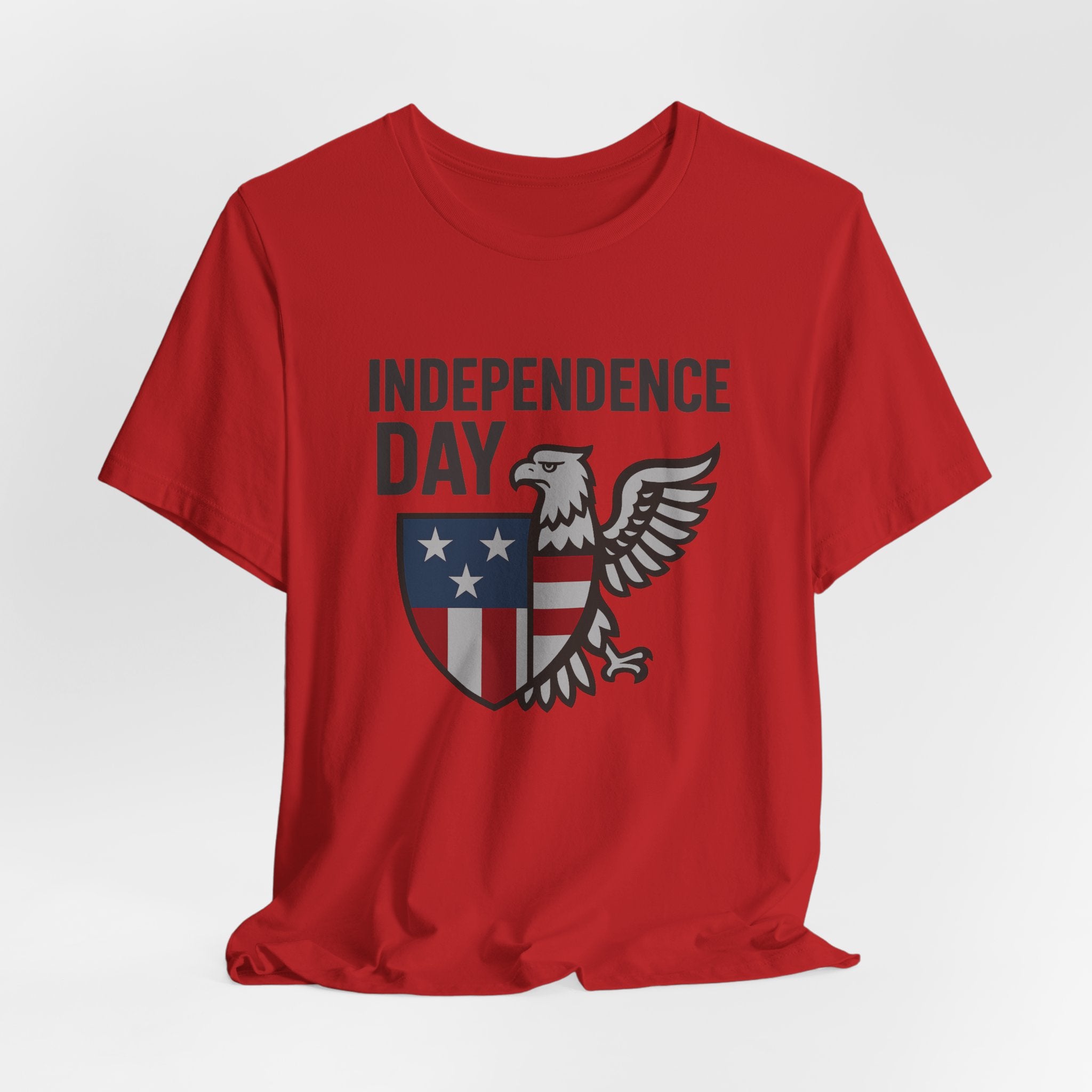 Red t-shirt with 'Independence Day' graphic featuring an eagle and shield on a white background