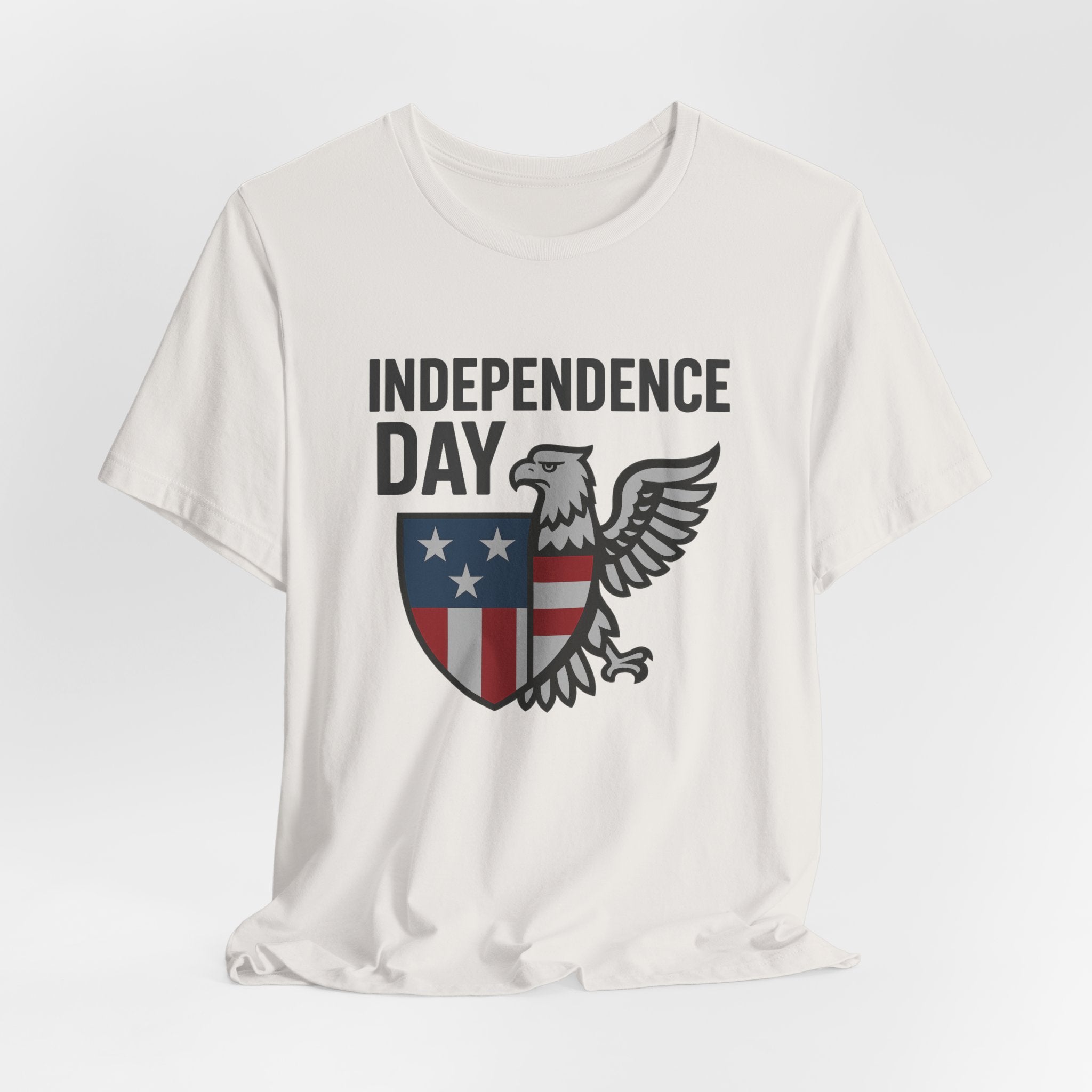 Vintage white t-shirt with 'Independence Day' graphic design featuring an eagle and shield on a white background