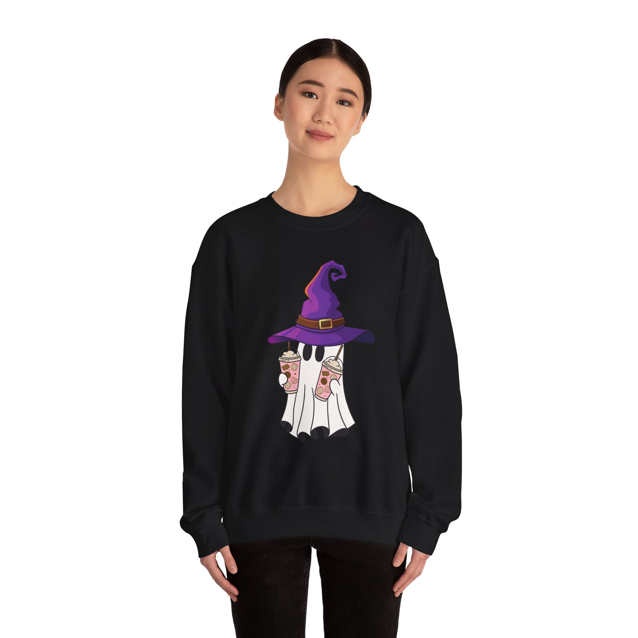 Black sweatshirt with a graphic design of a person in a witch costume on a white background