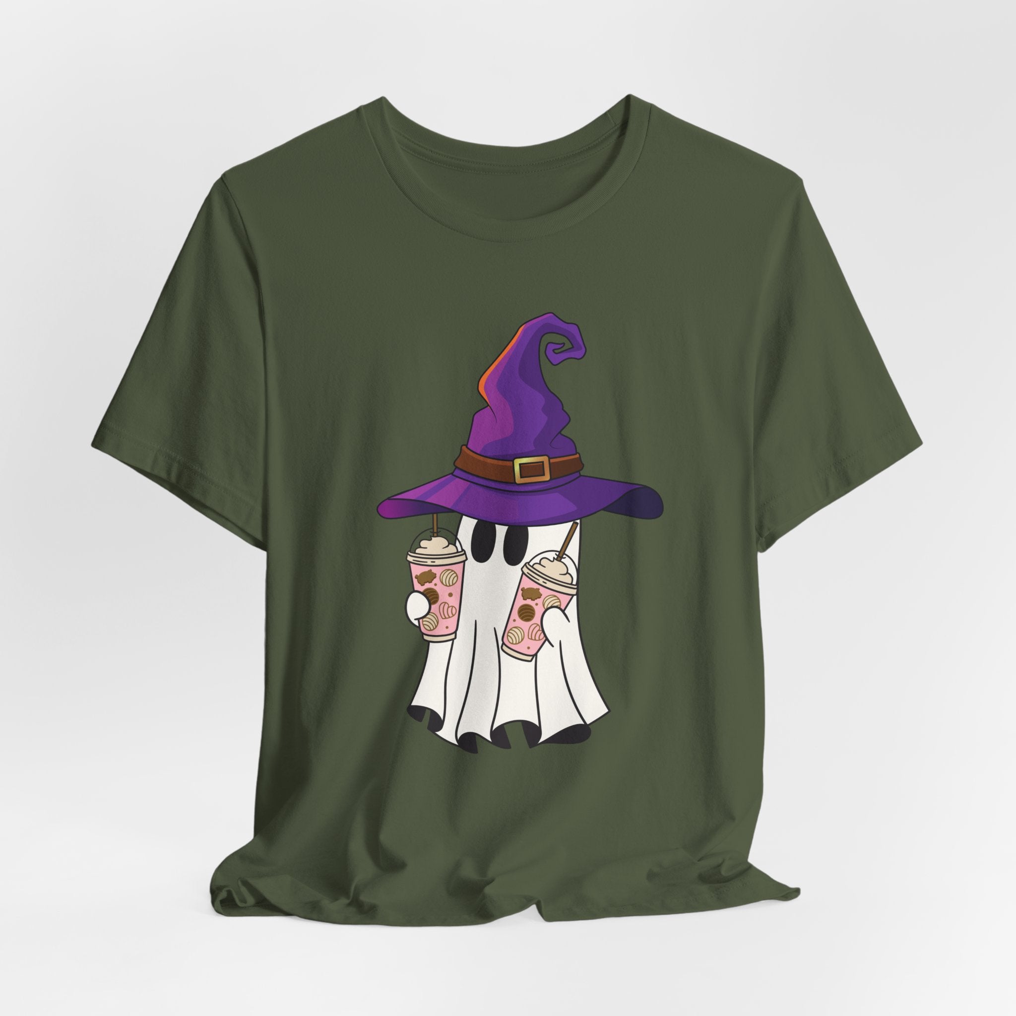 Military green t-shirt with ghost and purple witch hat graphic holding two cups of  juice on a light gray background 