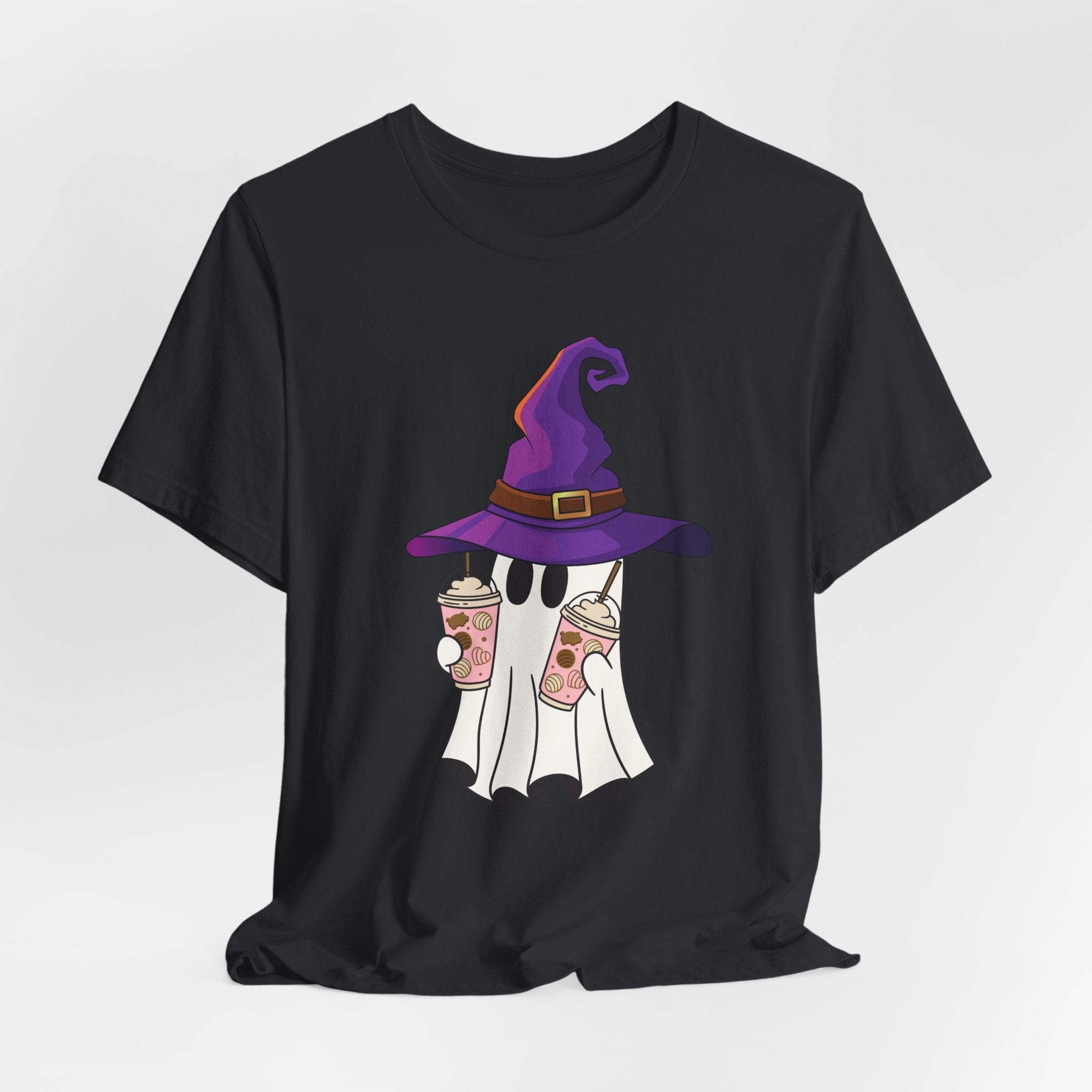Vintage black t-shirt with ghost and purple witch hat graphic holding two cups of  juice on a light gray background 