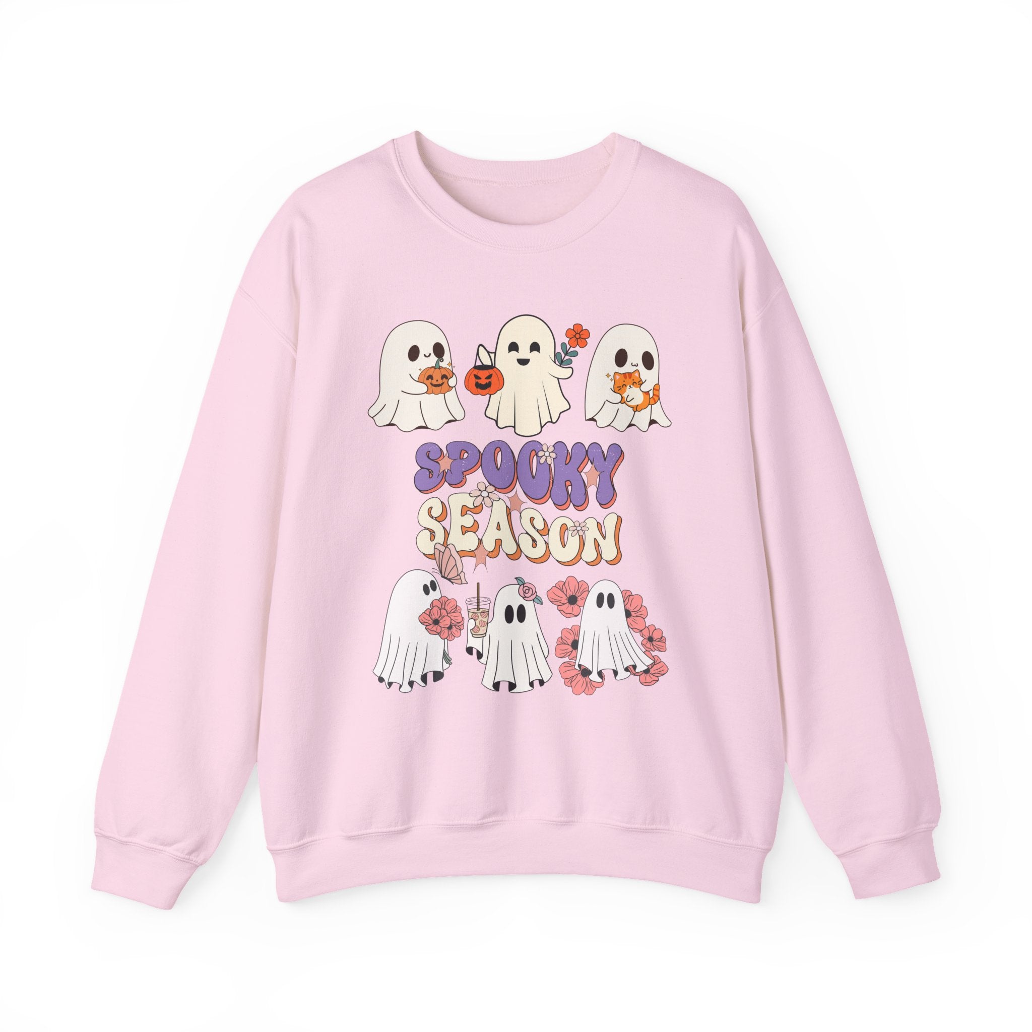 Pink sweatshirt with cartoon ghosts and 'Spooky Season' text on a white background