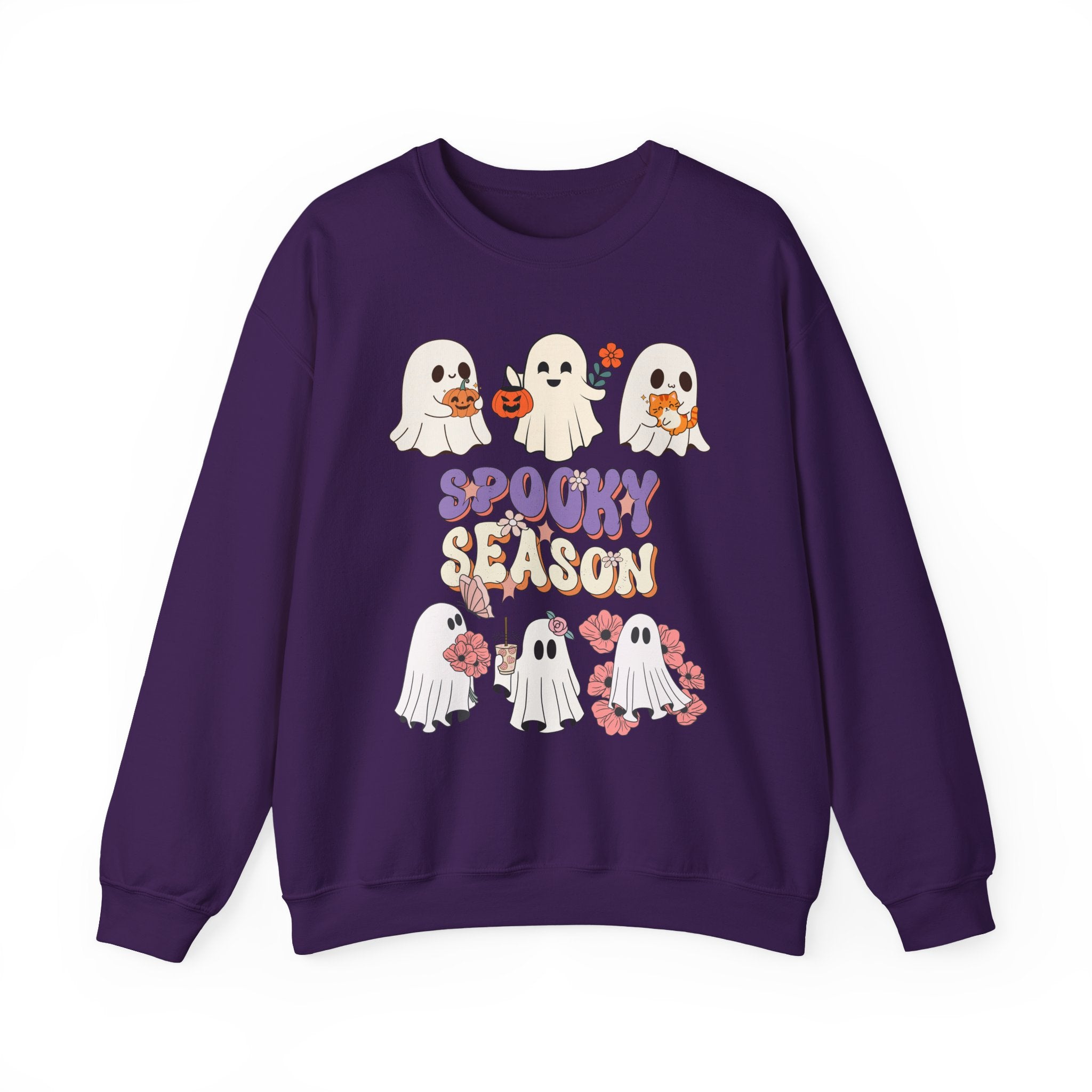 Purple sweatshirt with Halloween-themed design featuring ghosts and 'Spooky Season' text on a white background.