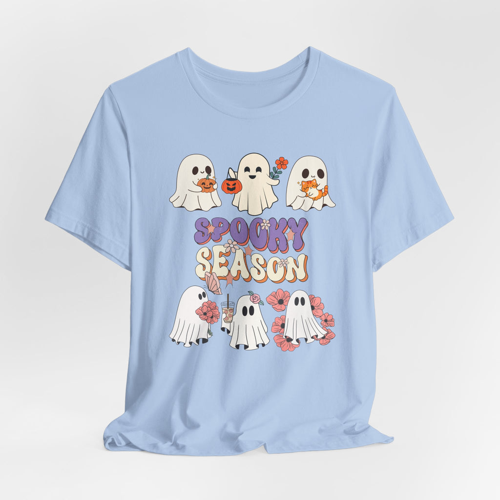 Light blue t-shirt with Halloween-themed design featuring ghosts and 'Spooky Season' text on a light gray background.