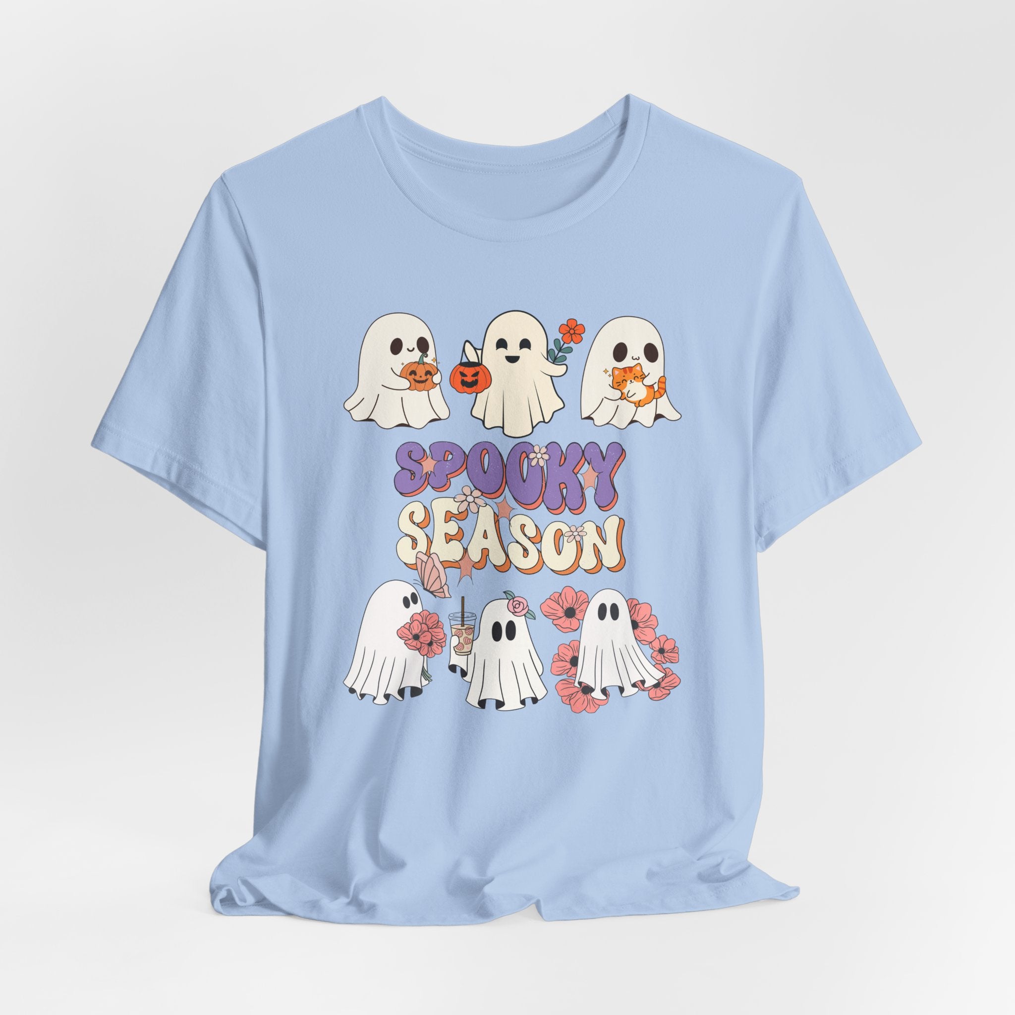 Light blue t-shirt with Halloween-themed design featuring ghosts and 'Spooky Season' text on a light gray background.