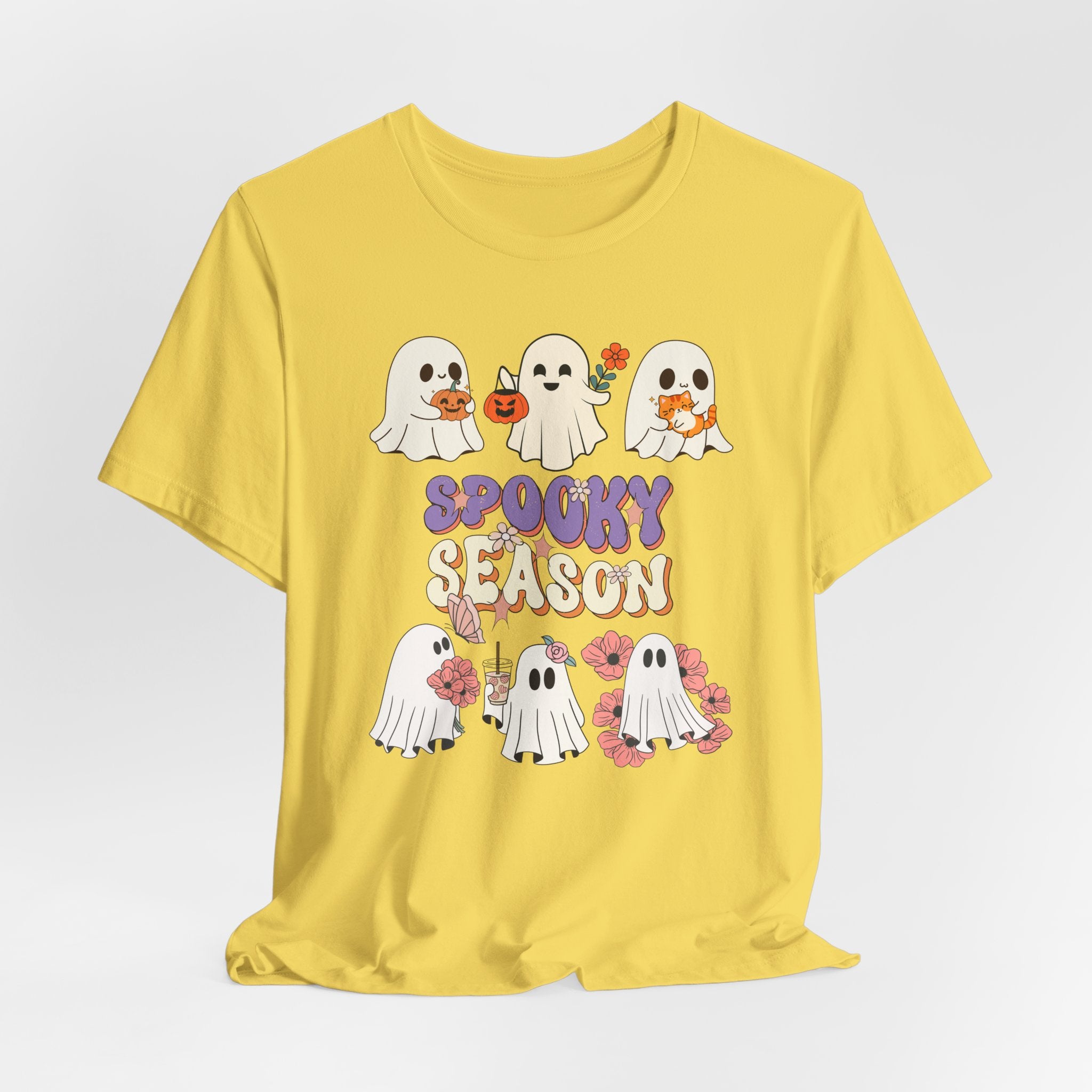 Maze yellow t-shirt with Halloween-themed design featuring ghosts and 'Spooky Season' text on a white background.