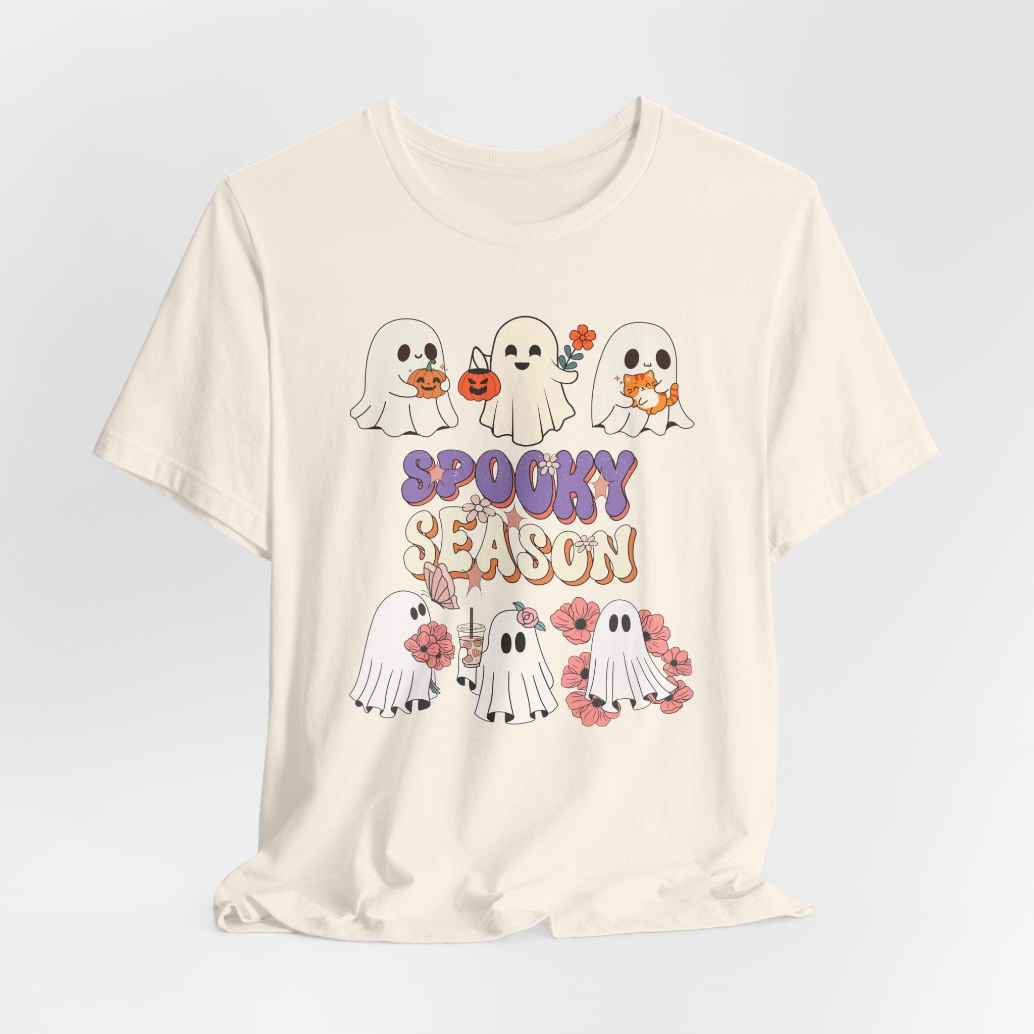 Natural beige t-shirt with Halloween-themed graphic of ghosts and 'Spooky Season' text on a light gray background