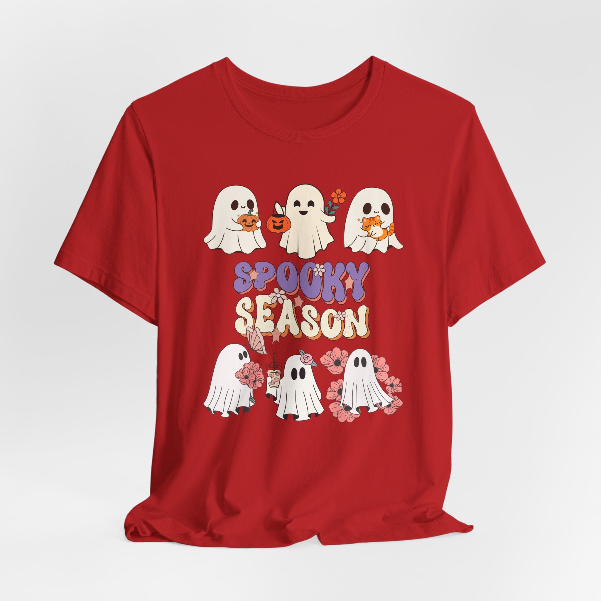 Red t-shirt with Halloween-themed design featuring ghosts and 'Spooky Season' text on a white background.