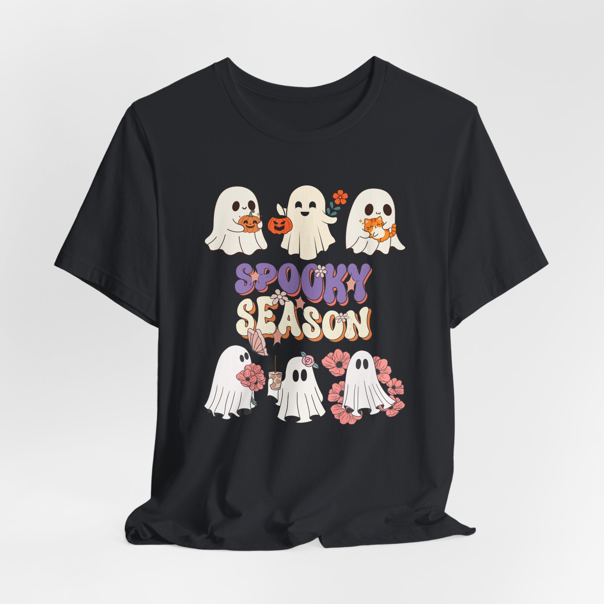 Vintage black t-shirt with Halloween-themed design featuring ghosts and 'Spooky Season' text on a white background.