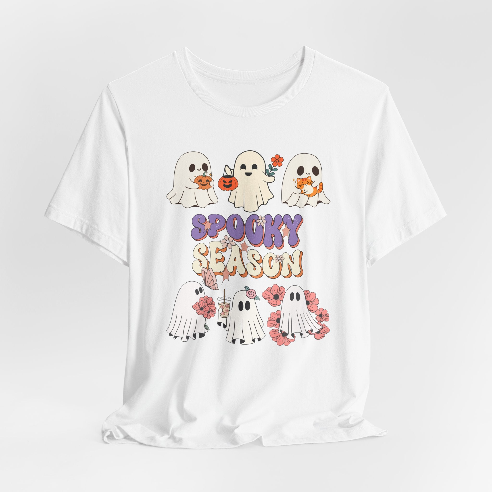 White t-shirt with Halloween-themed graphics and text on a white background