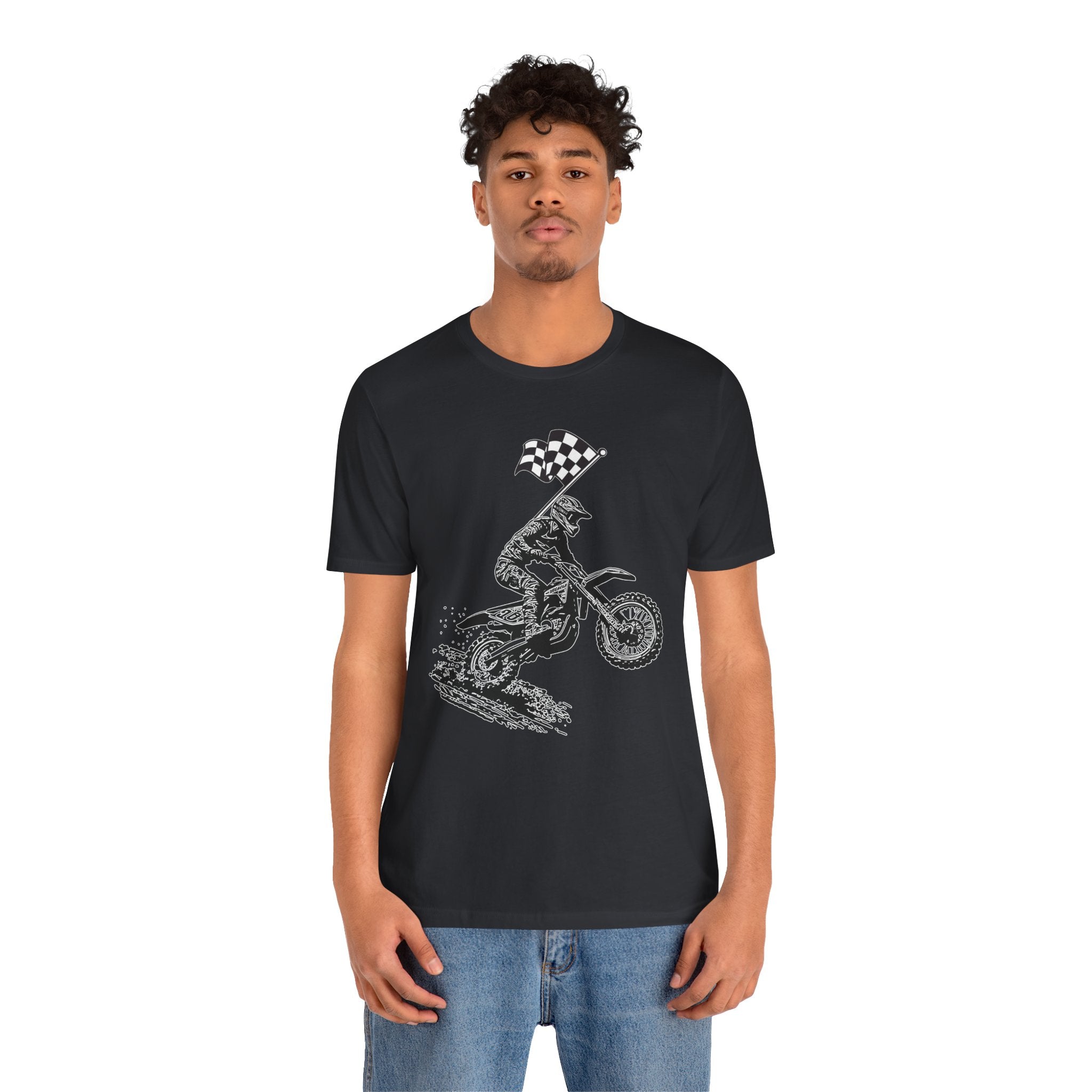 Person wearing a black t-shirt with a graphic design on a white background