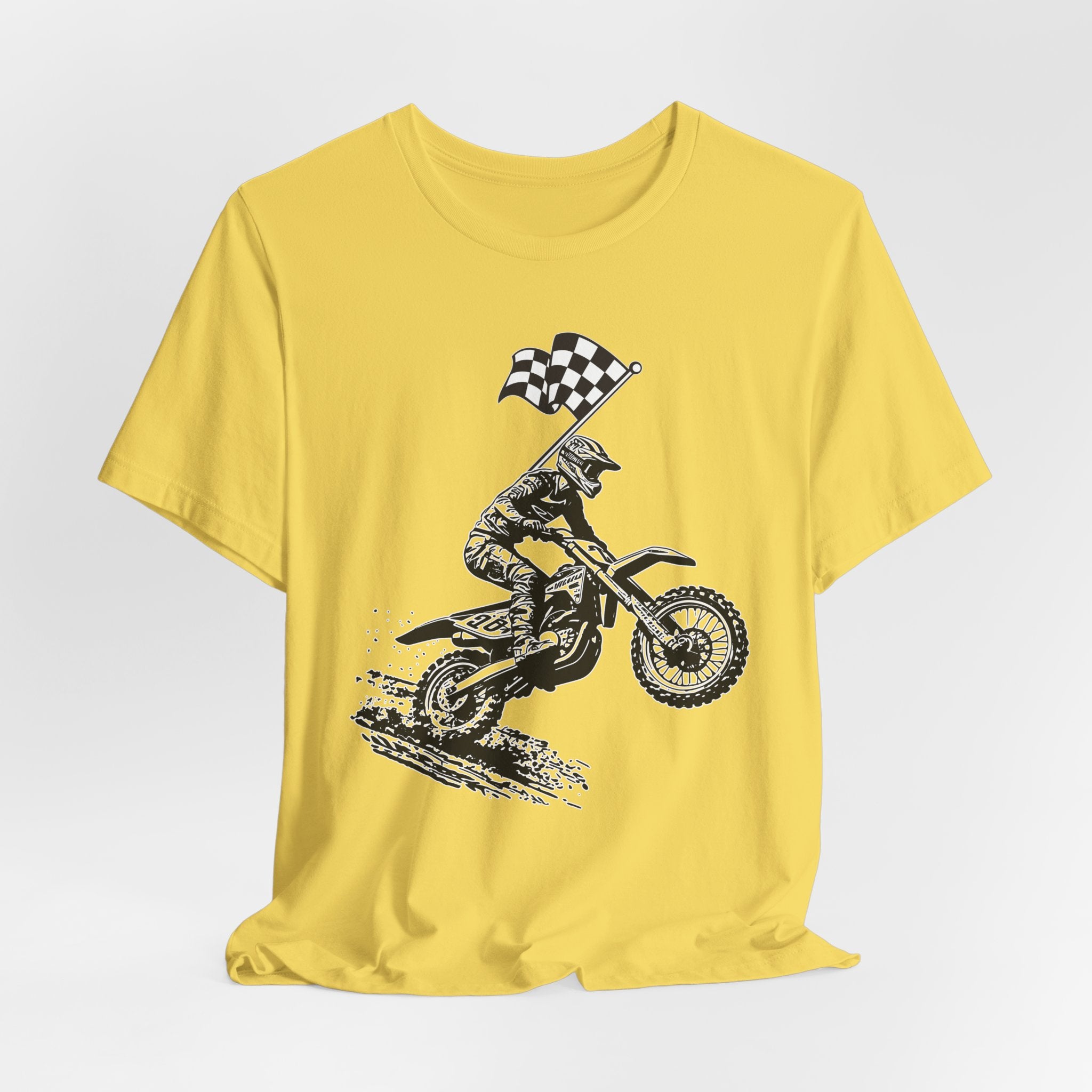 Yellow t-shirt with a graphic of a extreme dirt motocross rider and checkered flag on a white background