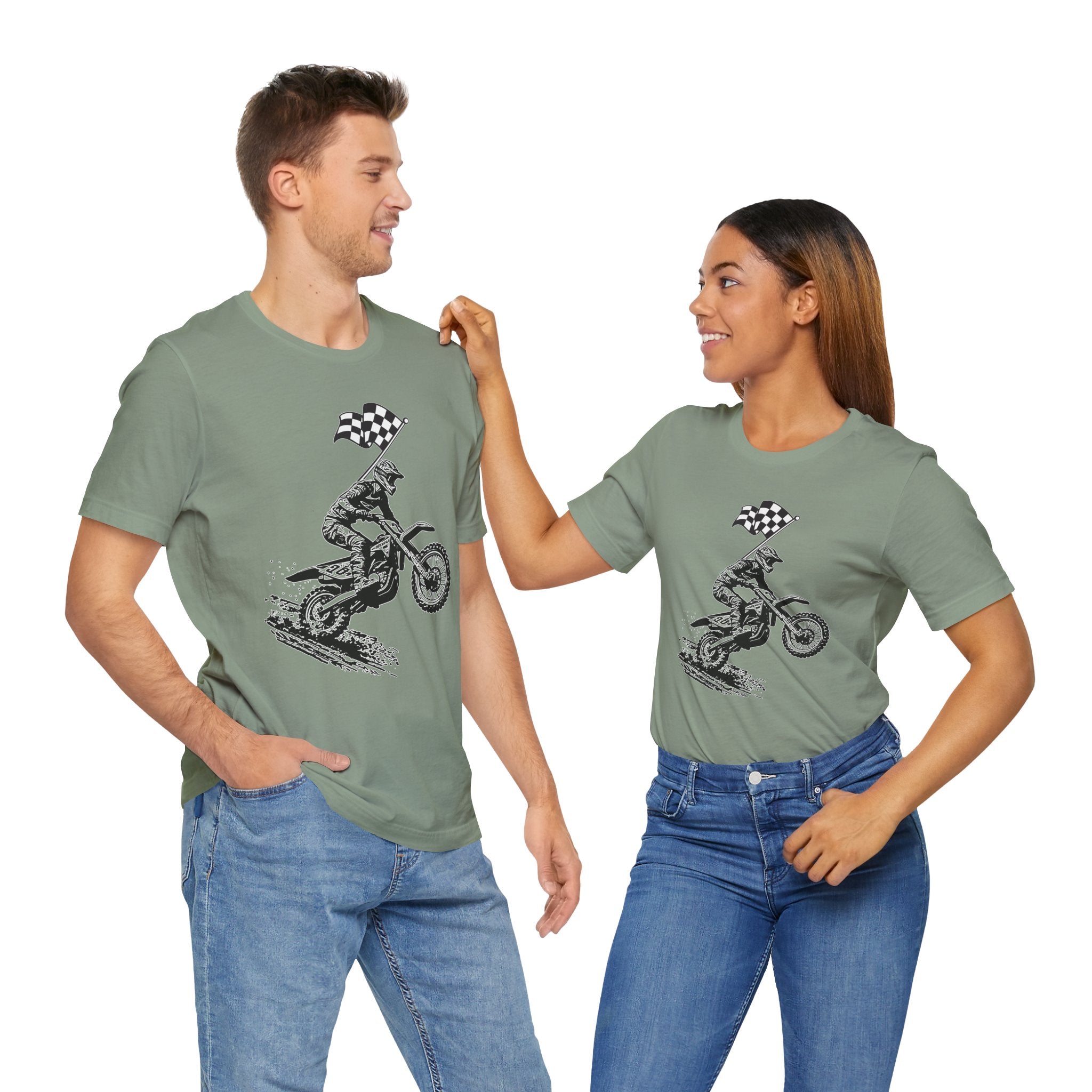 Two people wearing matching green t-shirts with a graphic design on a white background