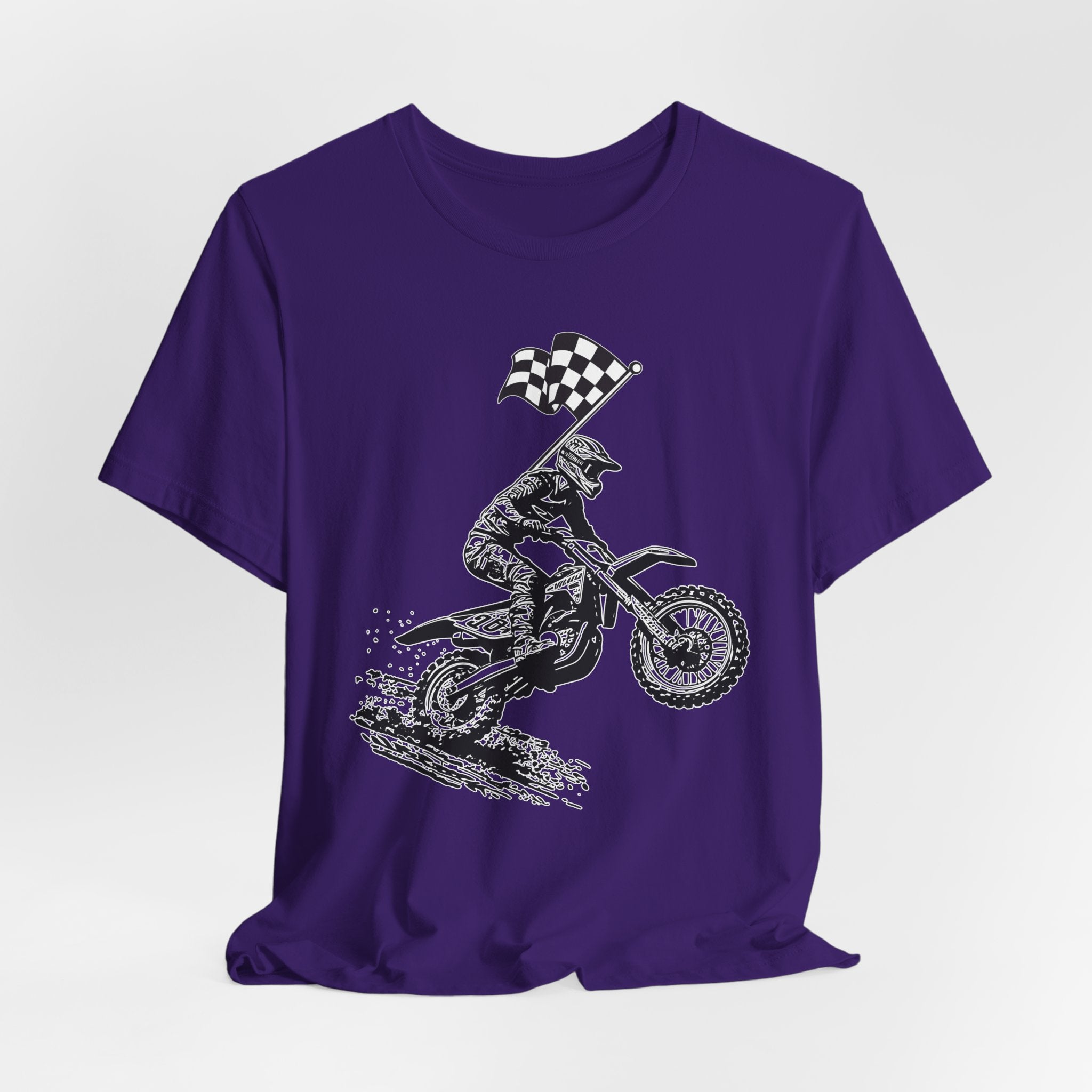 Purple t-shirt with a graphic of a extreme dirt motocross rider and checkered flag on a white background