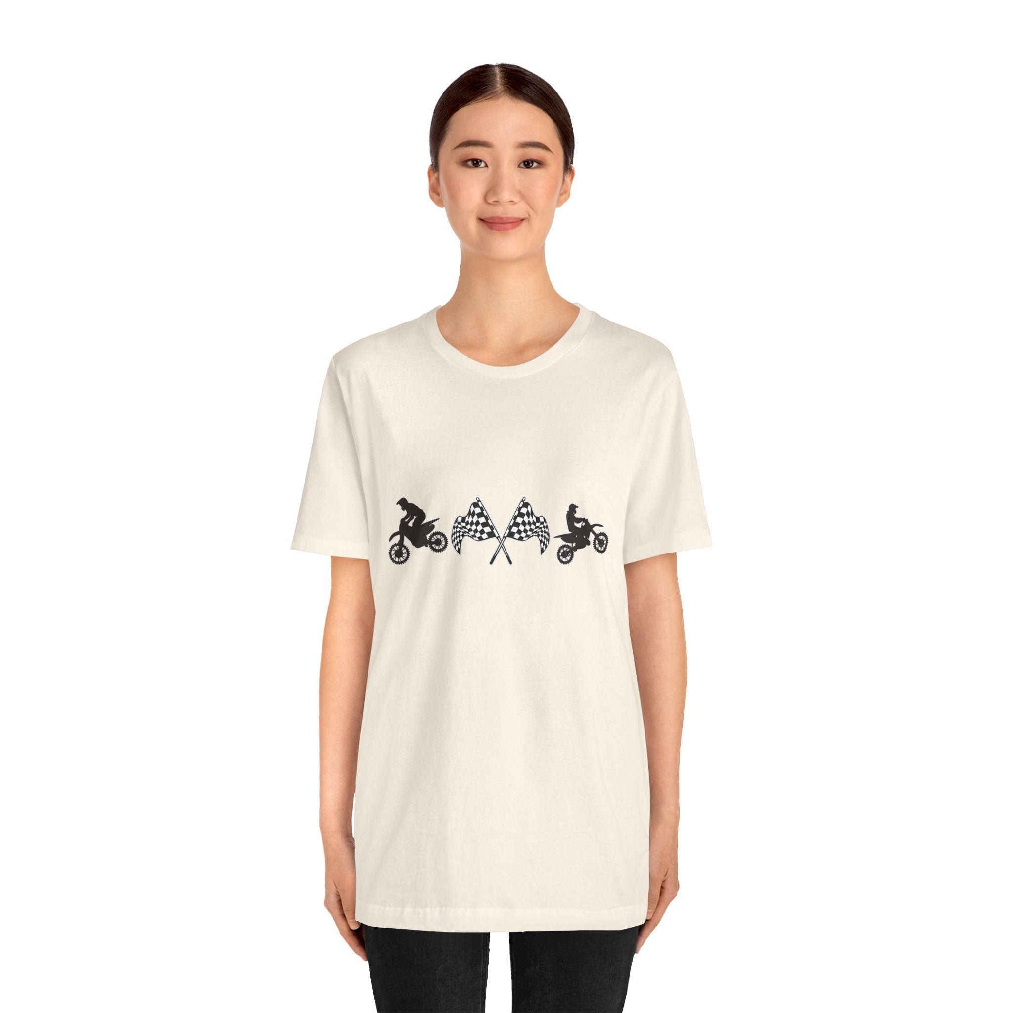 Person wearing a beige t-shirt with black graphics on a white background