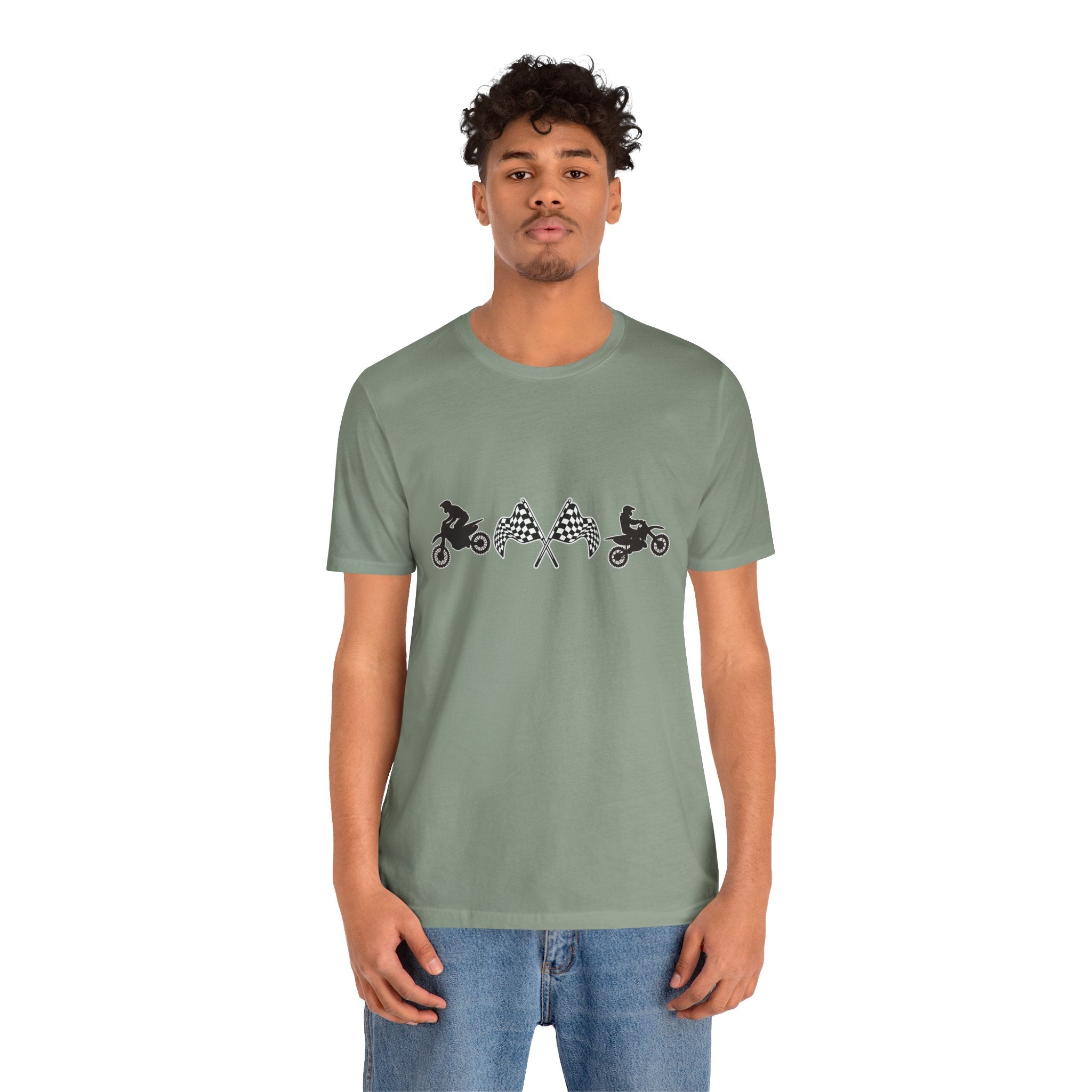 Person wearing a green t-shirt with graphic designs on a white background
