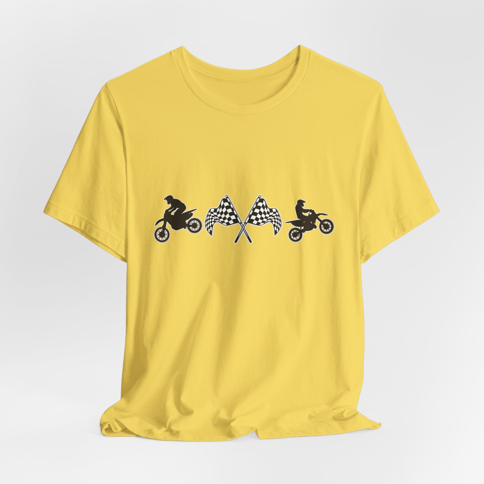 Yellow t-shirt with graphic design of two motocross dirt bike and checkered flags on a white background