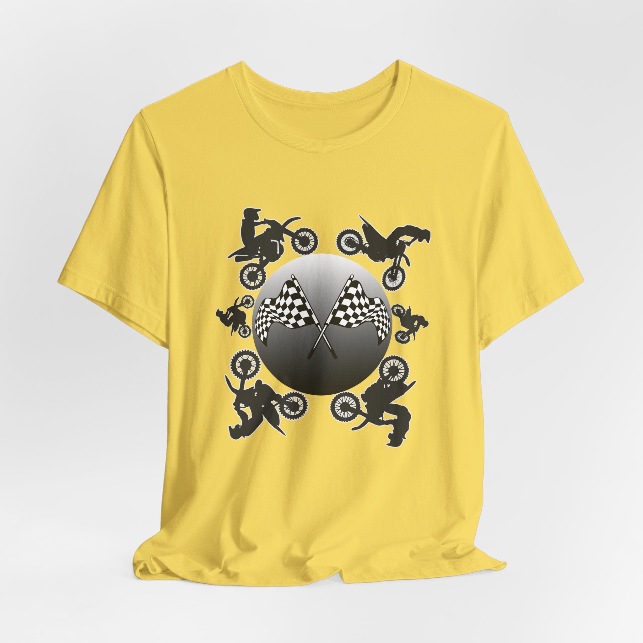 Yellow t-shirt with motocross dirt bike graphics and checkered flags on a light gray background