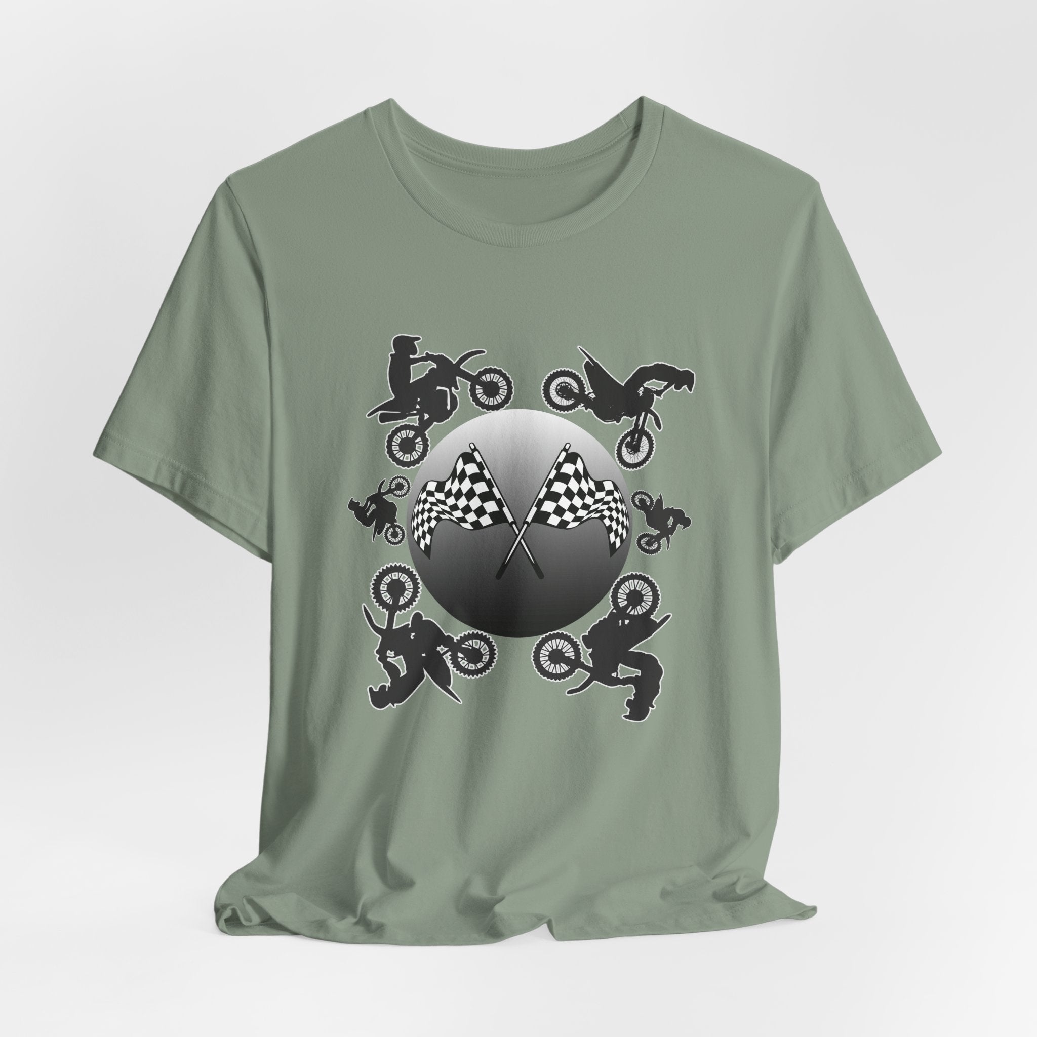 Sage green t-shirt with motocross dirt bike graphics and checkered flags on a light gray background