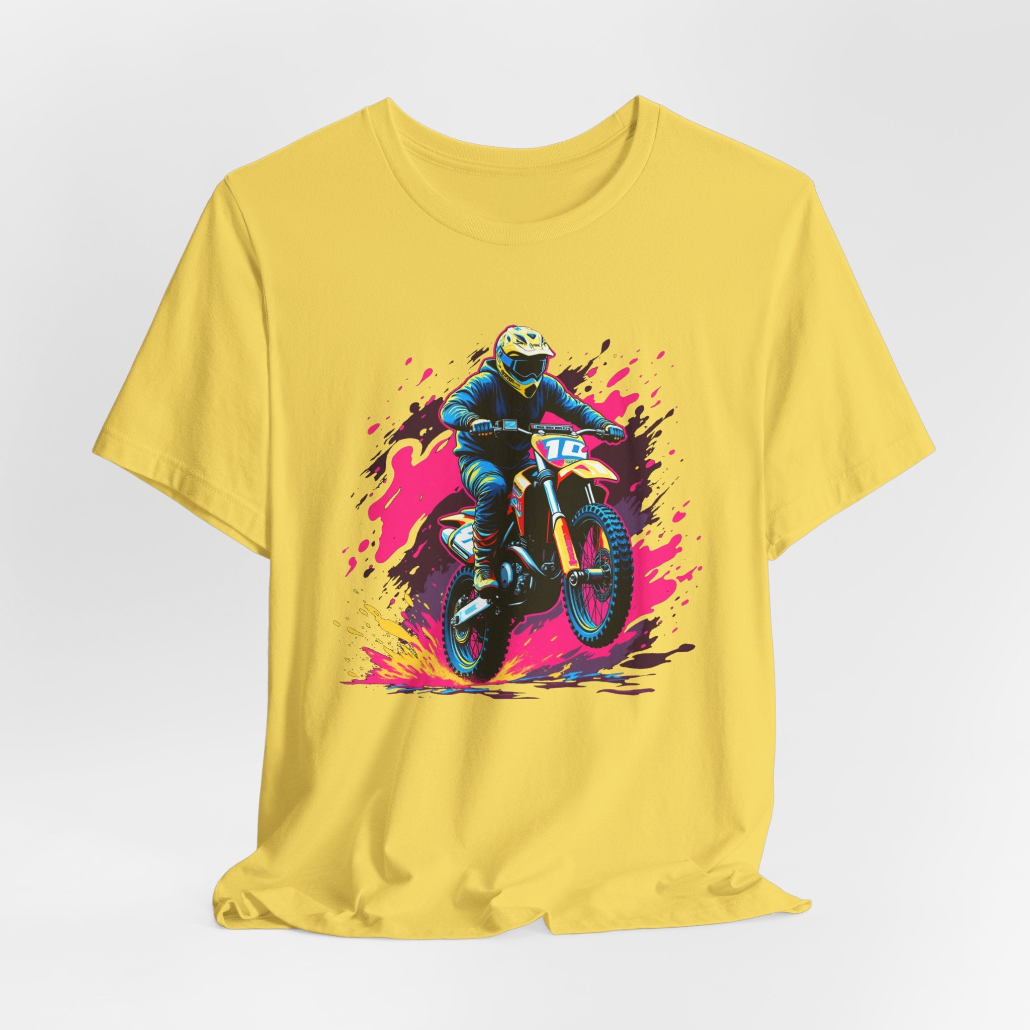 Yellow t-shirt with a graphic of a motocross rider on a colorful background