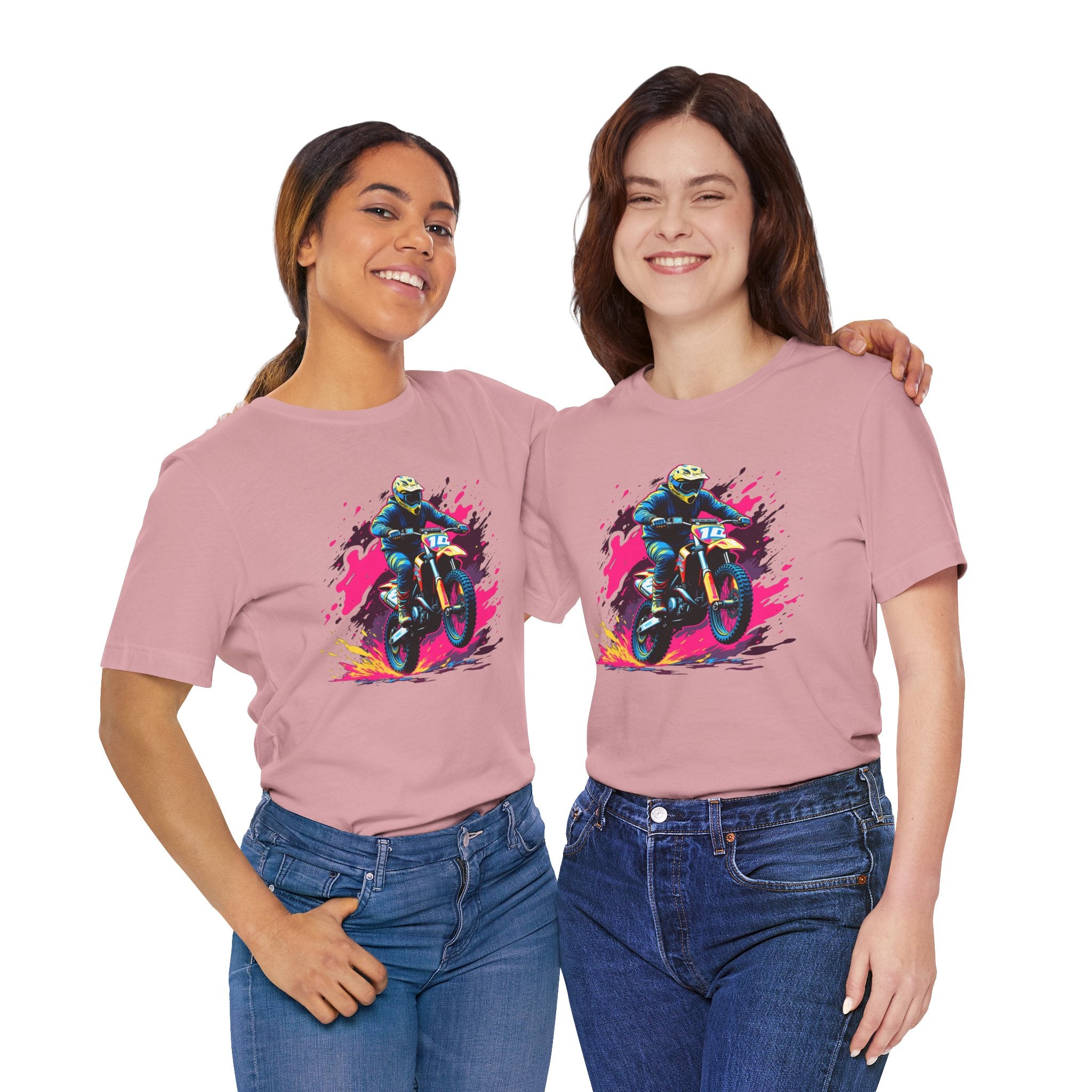 Two women wearing pink t-shirts with a motorcycle graphic on a white background
