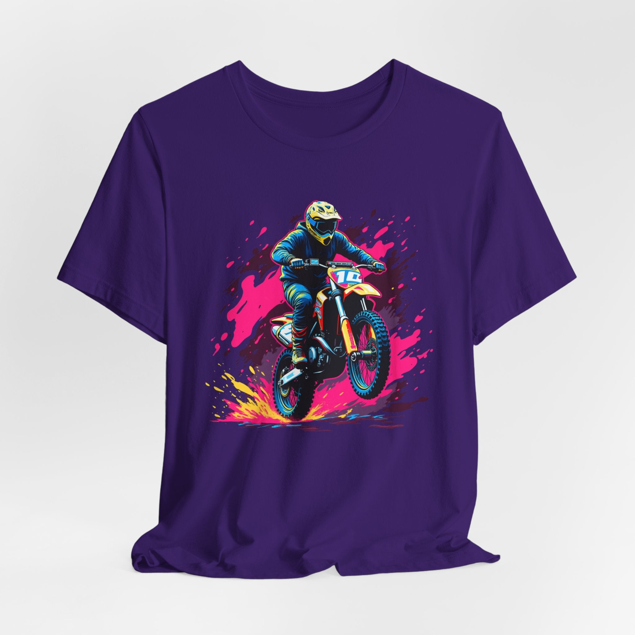 Purple t-shirt with a graphic of a motocross rider on a bike against a colorful abstract background.