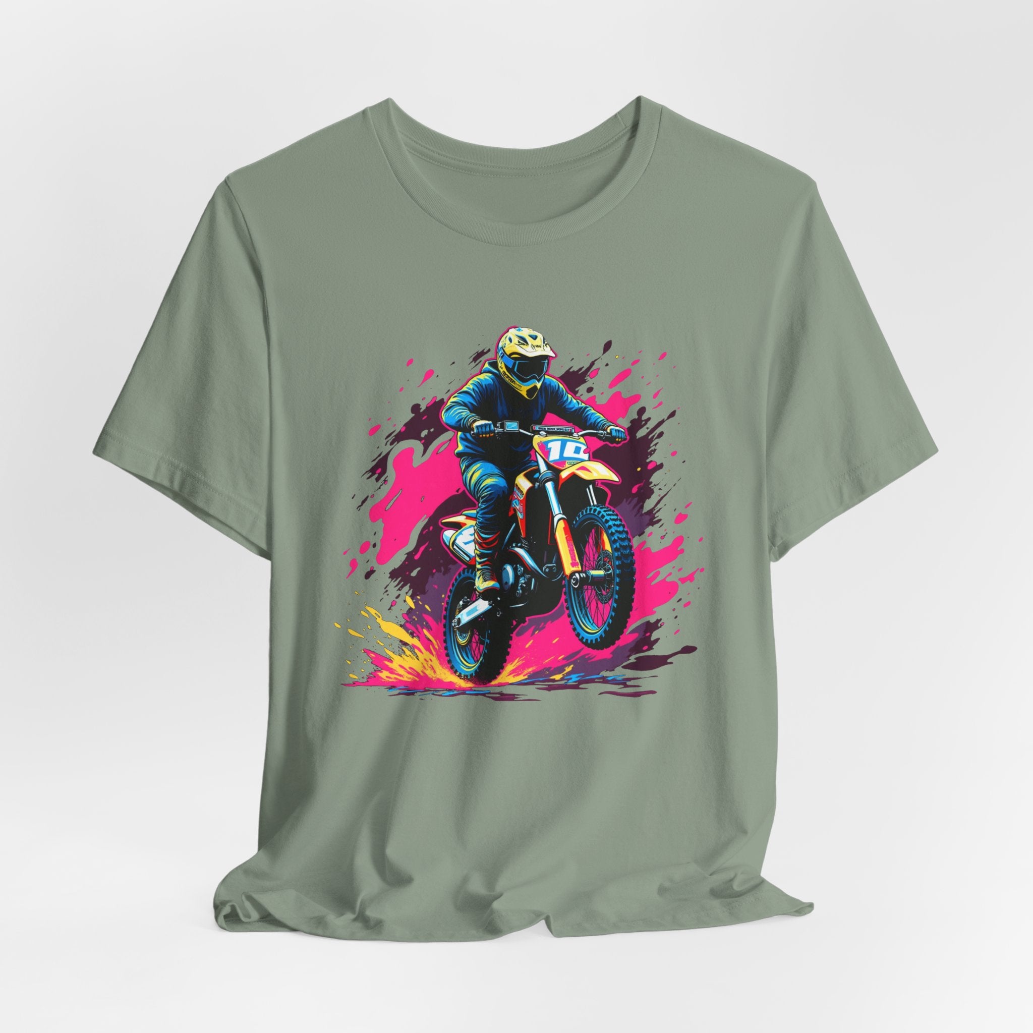 Sage green t-shirt with a graphic of a motocross rider on a colorful background