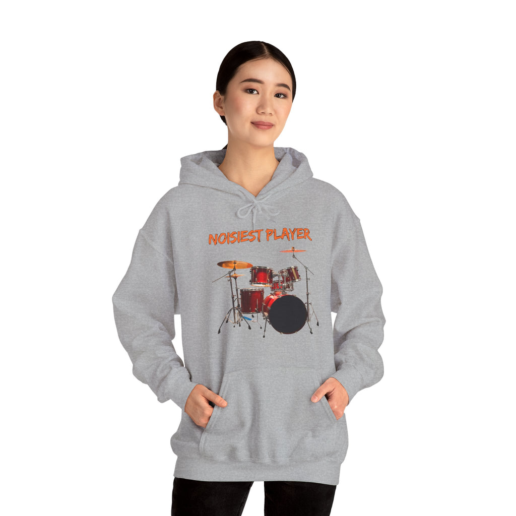 Person wearing a gray hoodie with a drum design and 'Noisest Player' text on a white background