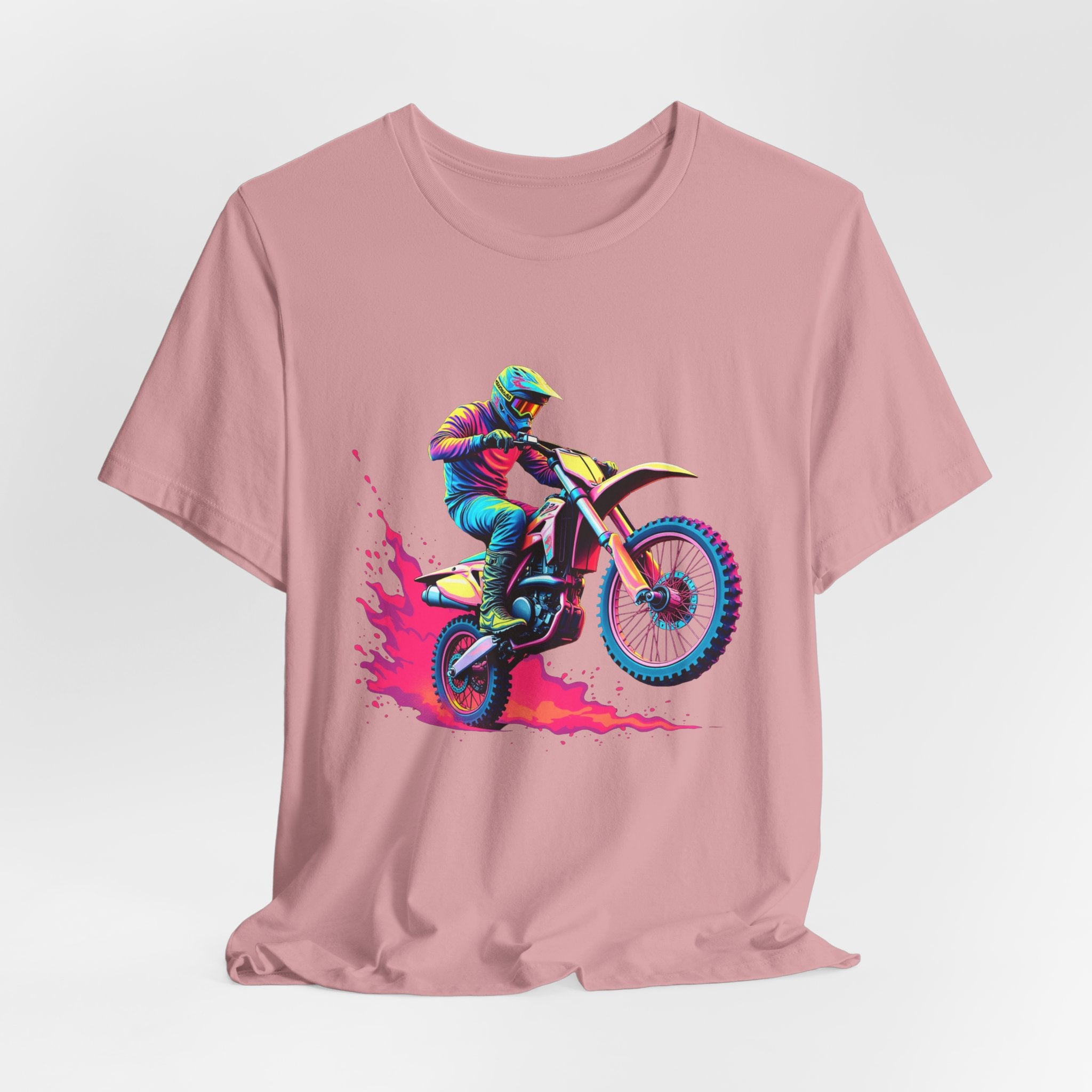 Orchid pink t-shirt with a graphic of a motocross rider on a bike in a white background
