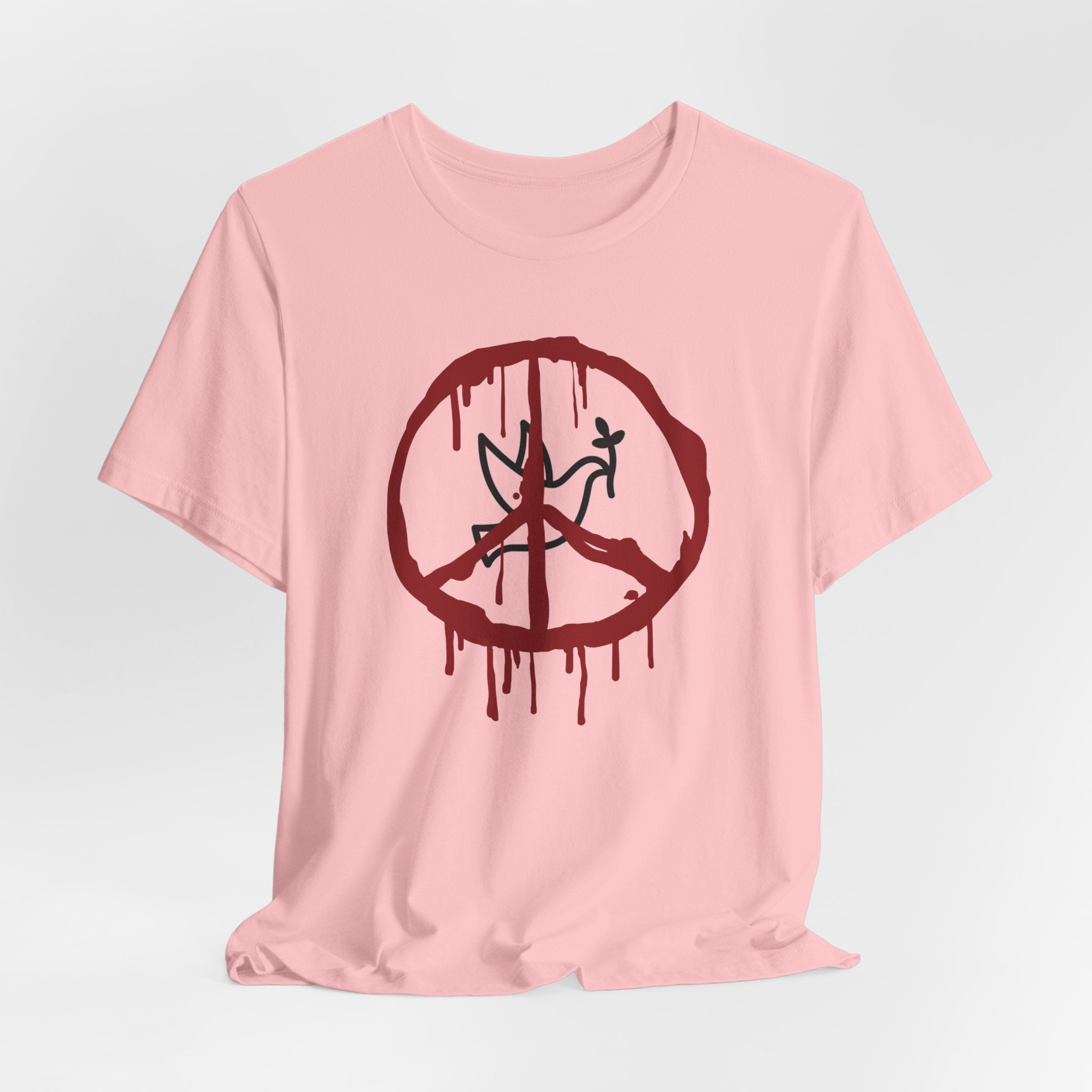 Pink t-shirt with a bloody peace symbol design in front of dove graphic on a white background