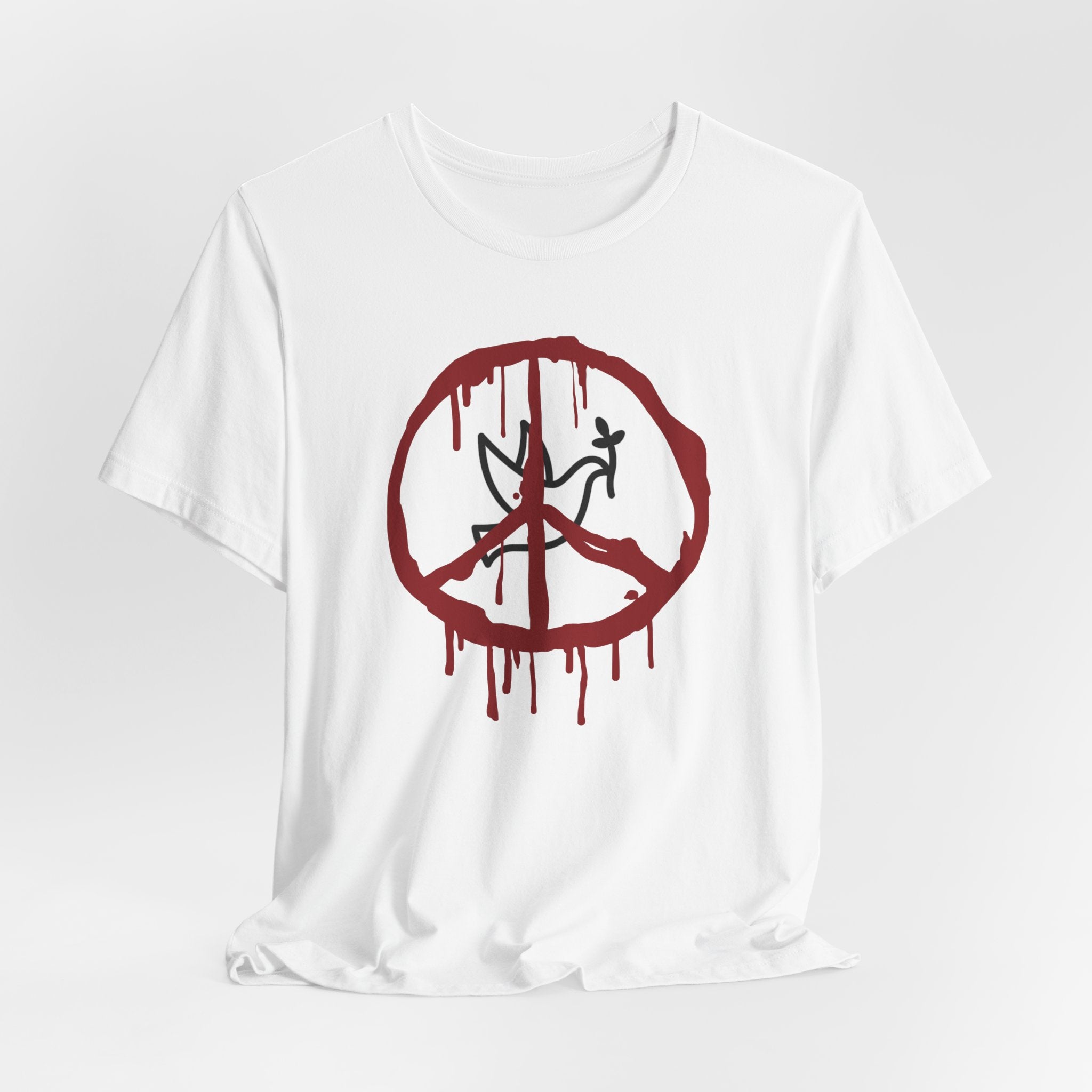 White t-shirt with a bloody peace symbol design in front of dove graphic on a white background