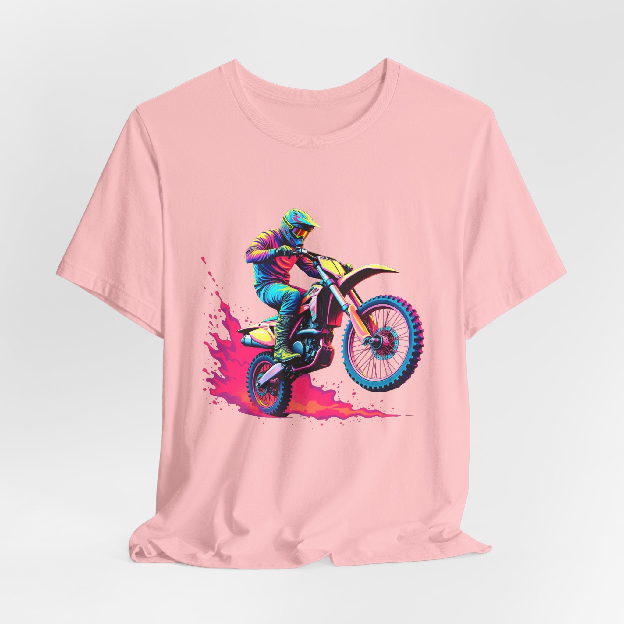 Pink t-shirt with a graphic of a motocross rider on a bike against a light gray background