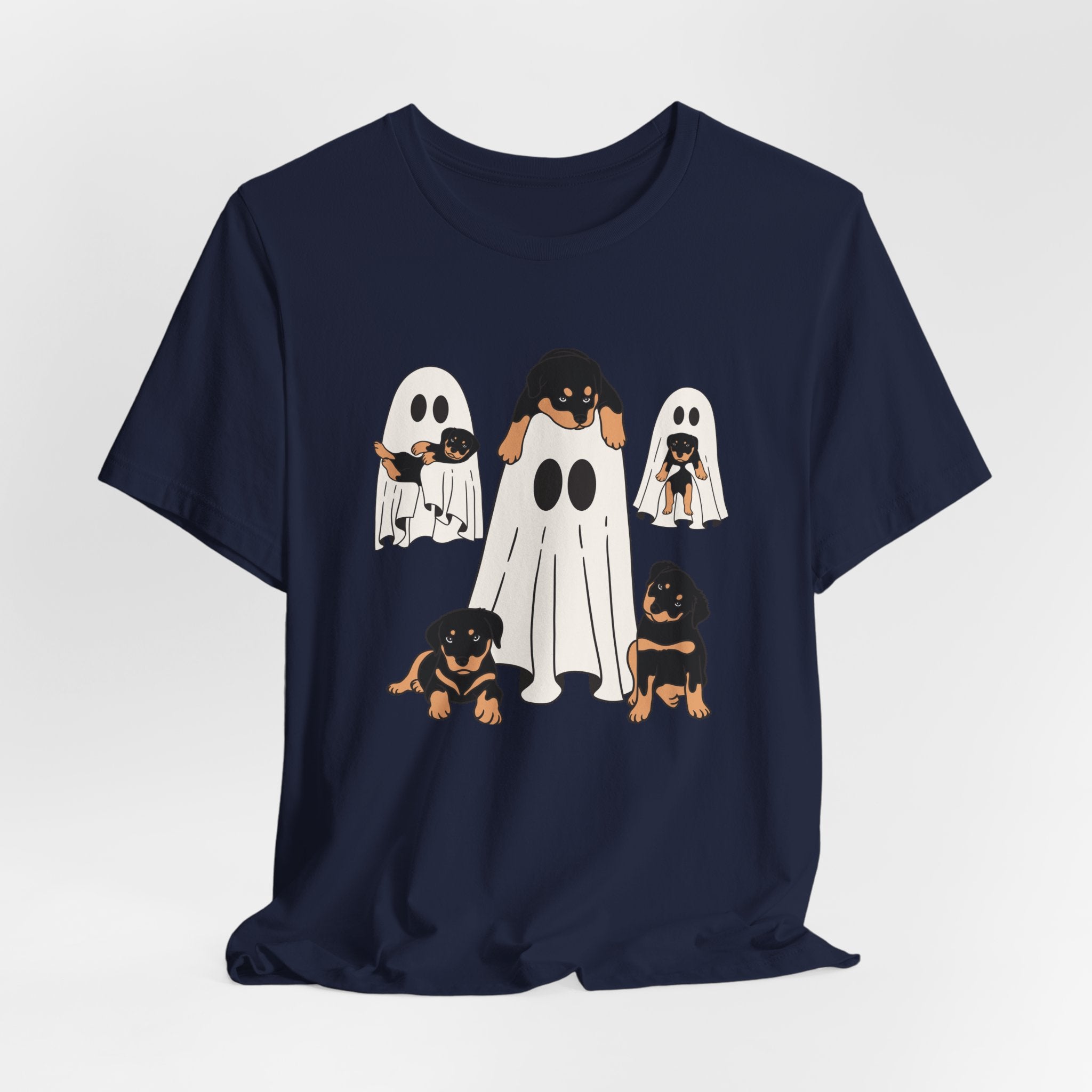 Navy blue t-shirt with Halloween-themed design of dogs in ghost costumes on a white background