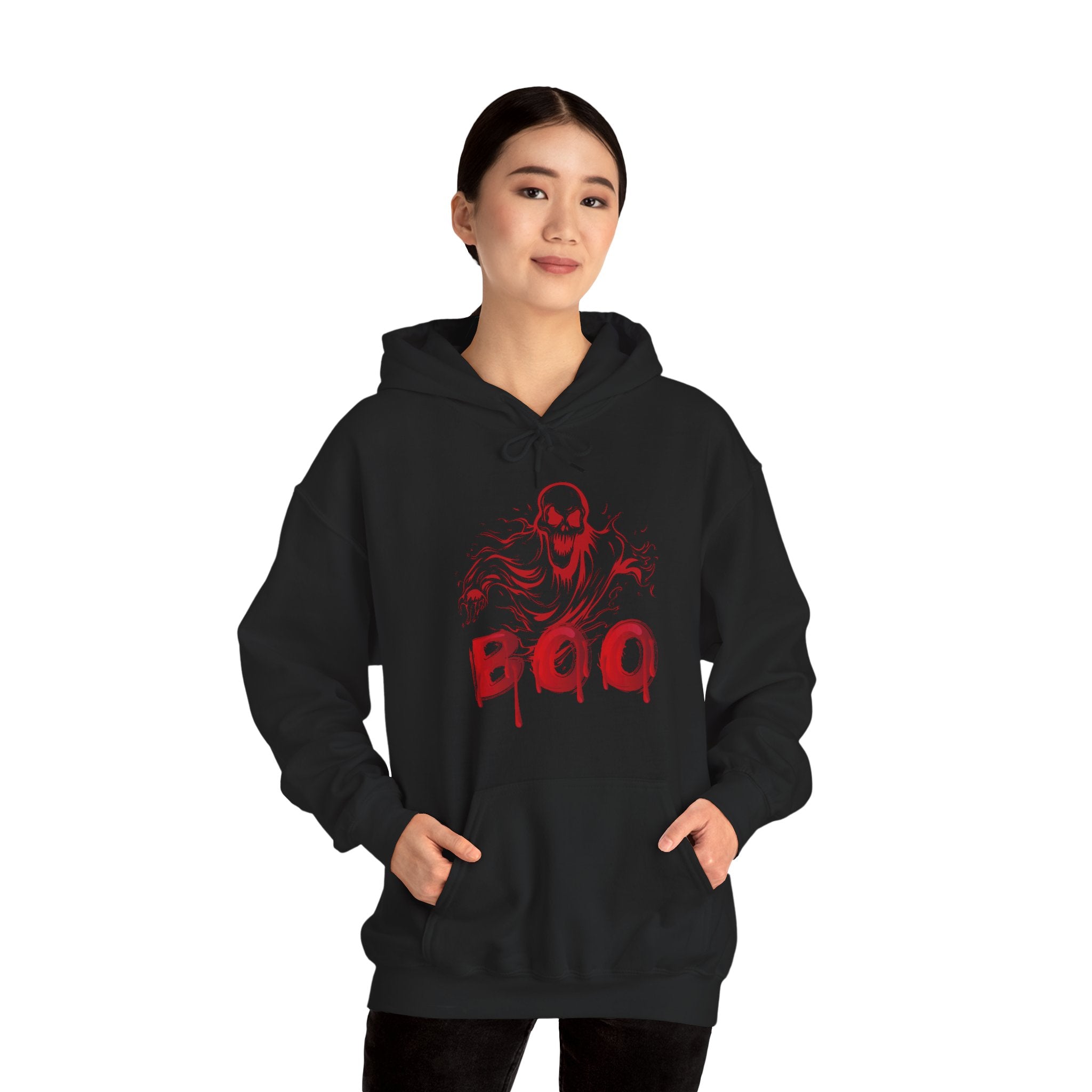 Person wearing a black hoodie with red graphic design on a white background