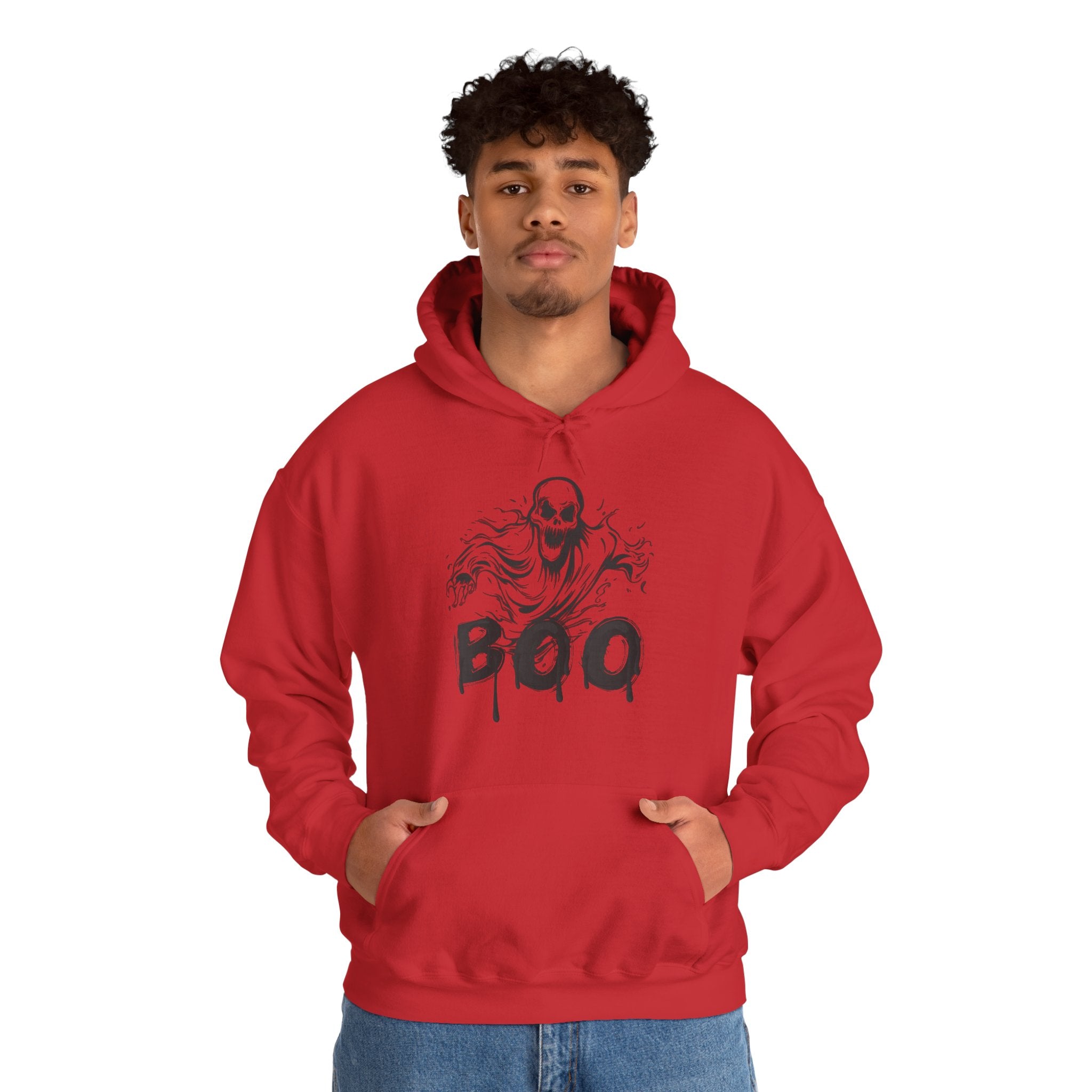 Person wearing a red hoodie with a ghost and 'BOO' design on a white background