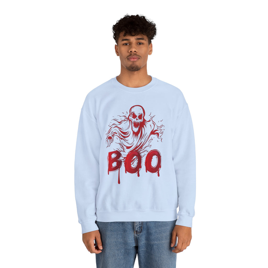 Person wearing a light blue sweatshirt with a red graphic design and 'BOO' text on a white background