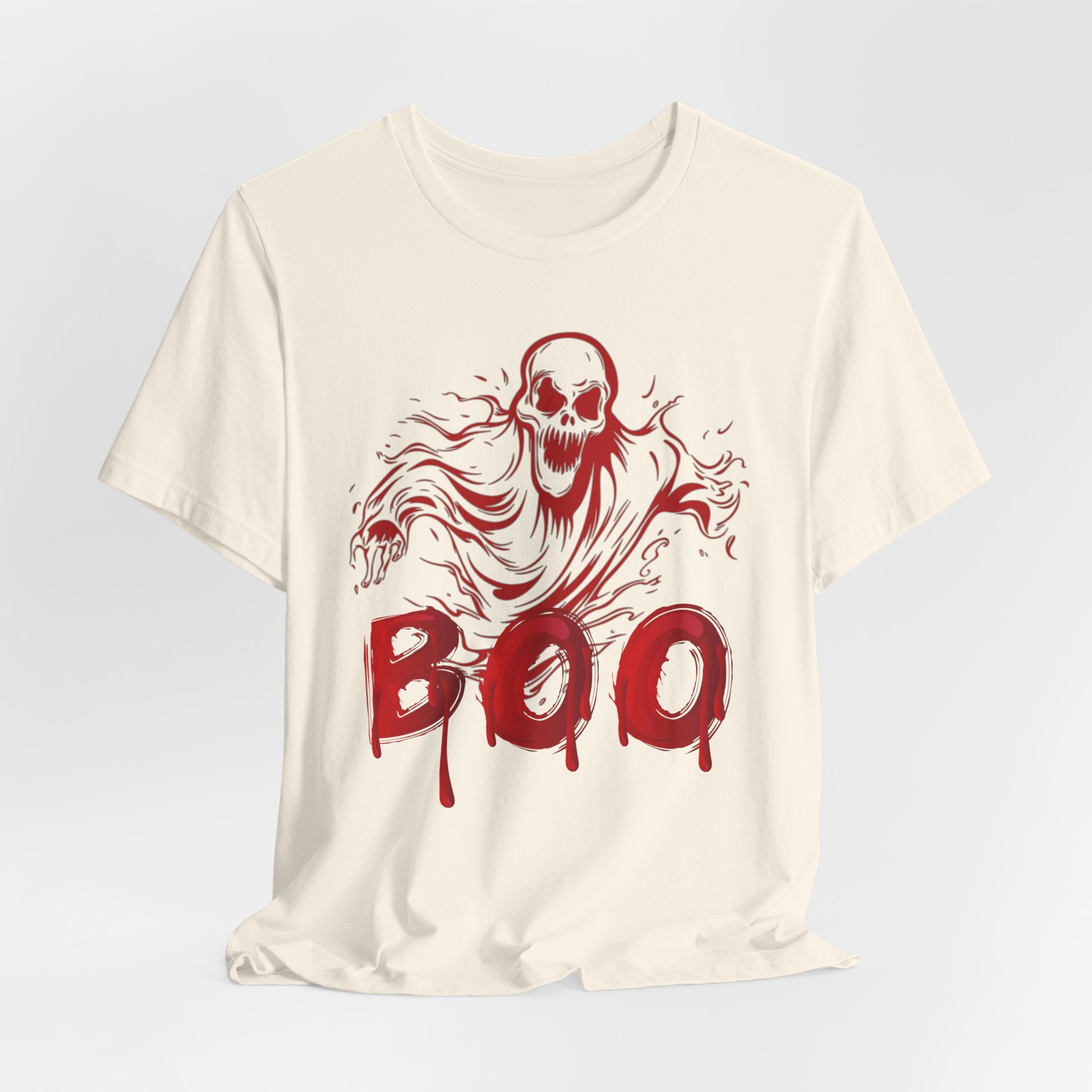 Ivory beige t-shirt with red ghost and 'BOO' graphic on a light gray background