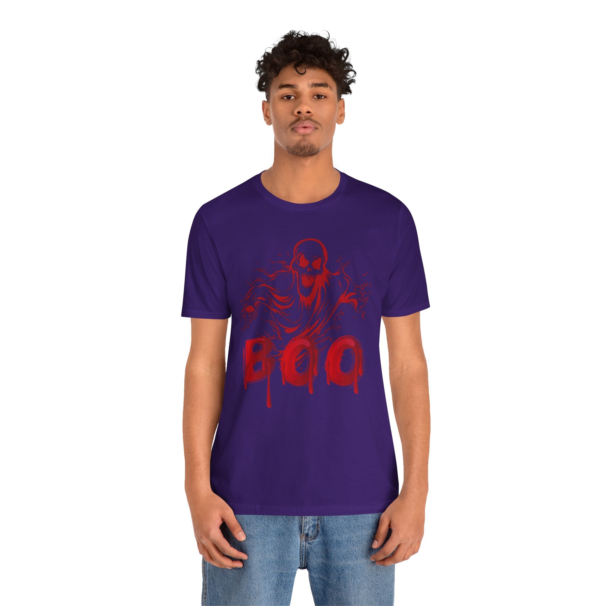 Person wearing a purple t-shirt with a red graphic design on a white background