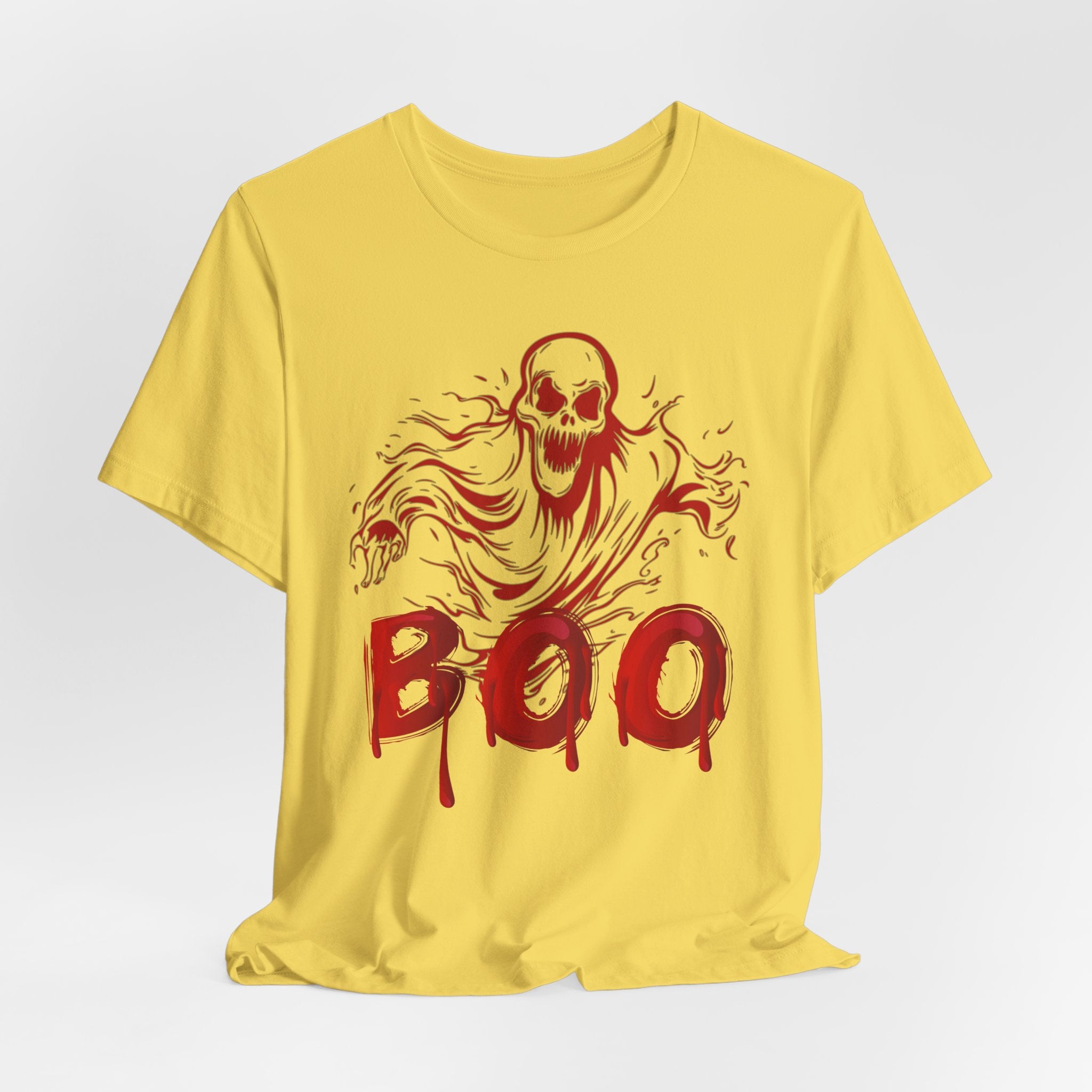 Yellow t-shirt with red ghost graphic and 'BOO' text on a white background