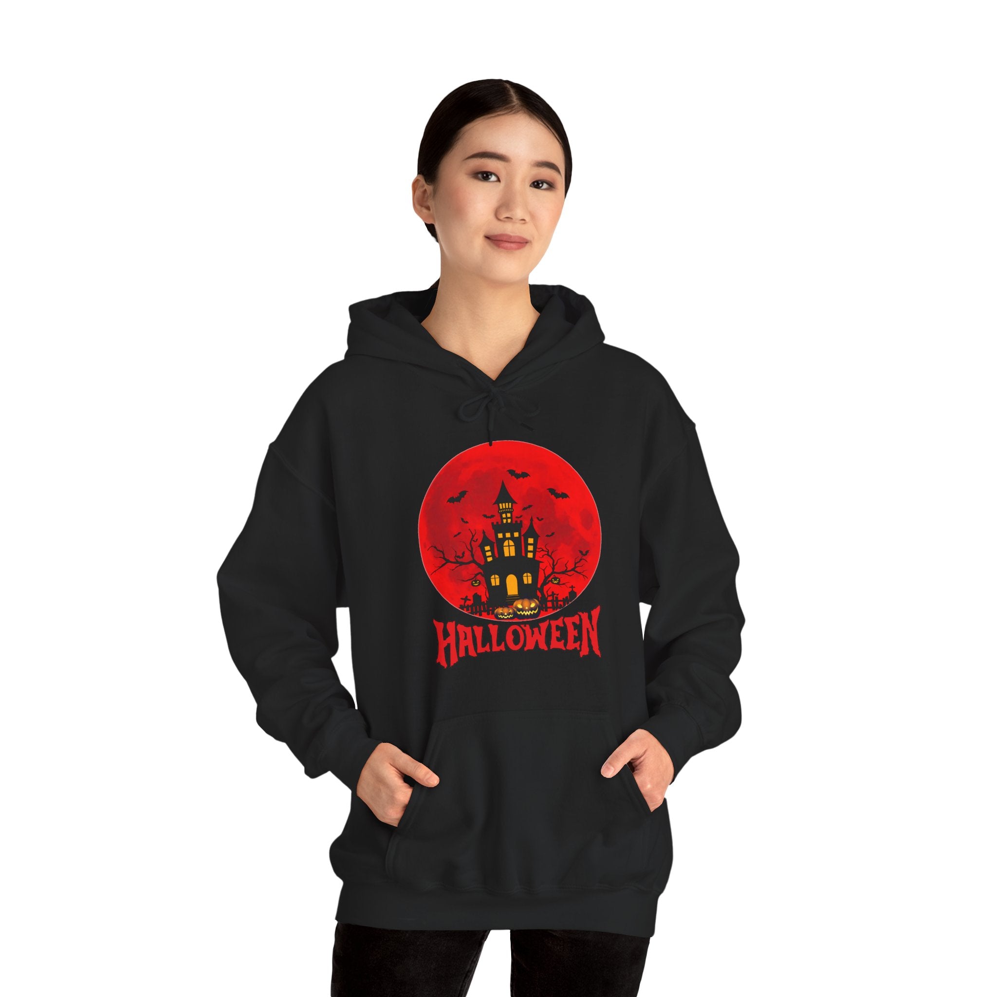 Person wearing a black hoodie with a Halloween-themed design on a white background