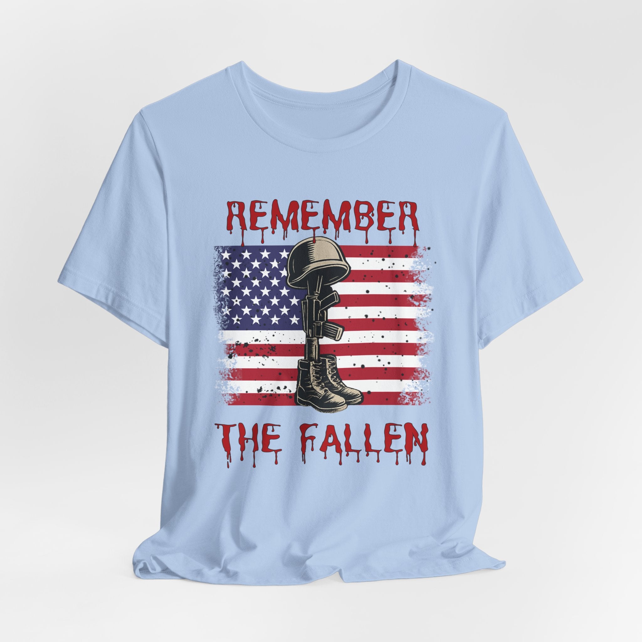 Baby light blue t-shirt with vintage American flag and military gear themed design with remember the fallen text on a white background