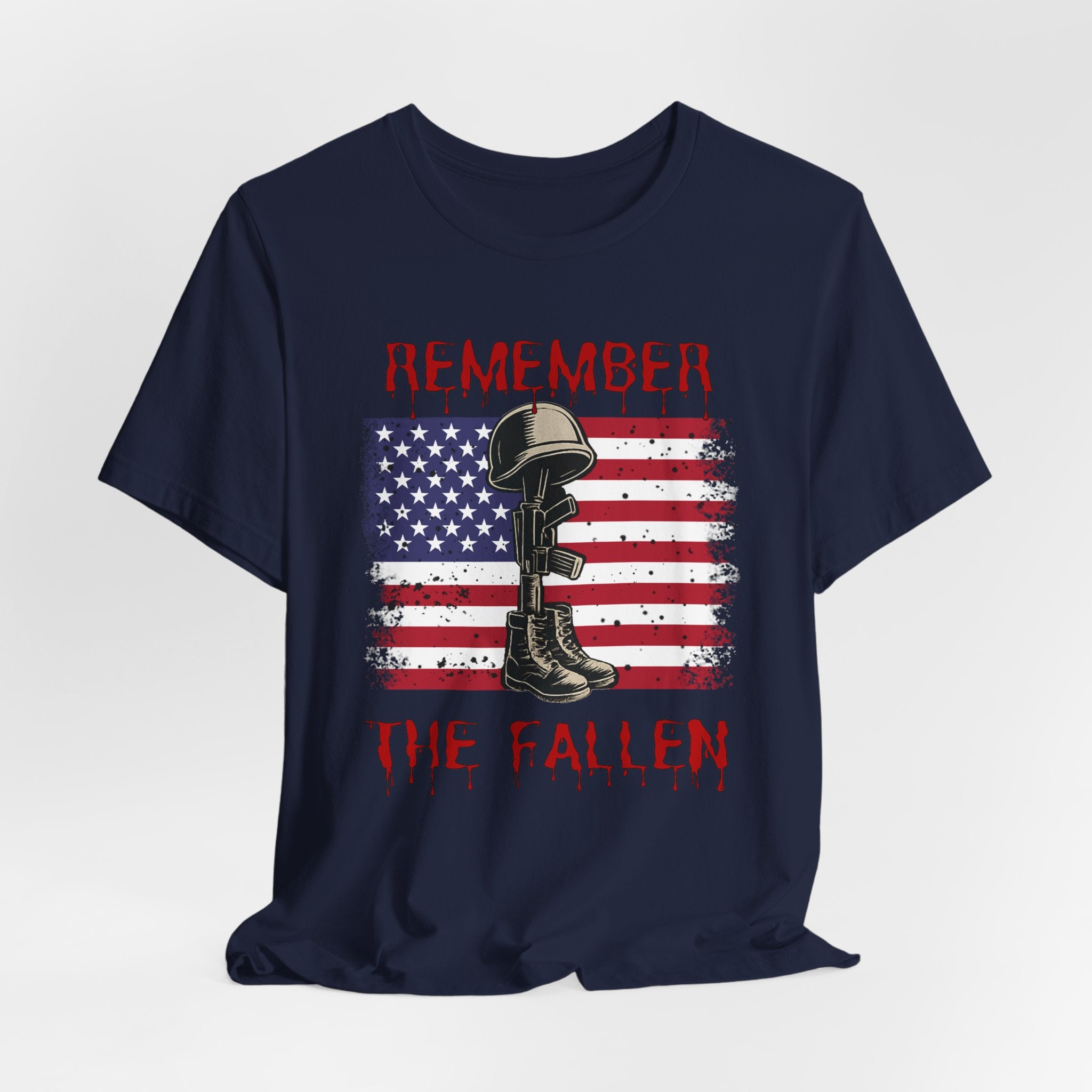 Navy blue t-shirt with vintage American flag and military gear themed design with remember the fallen text on a white background